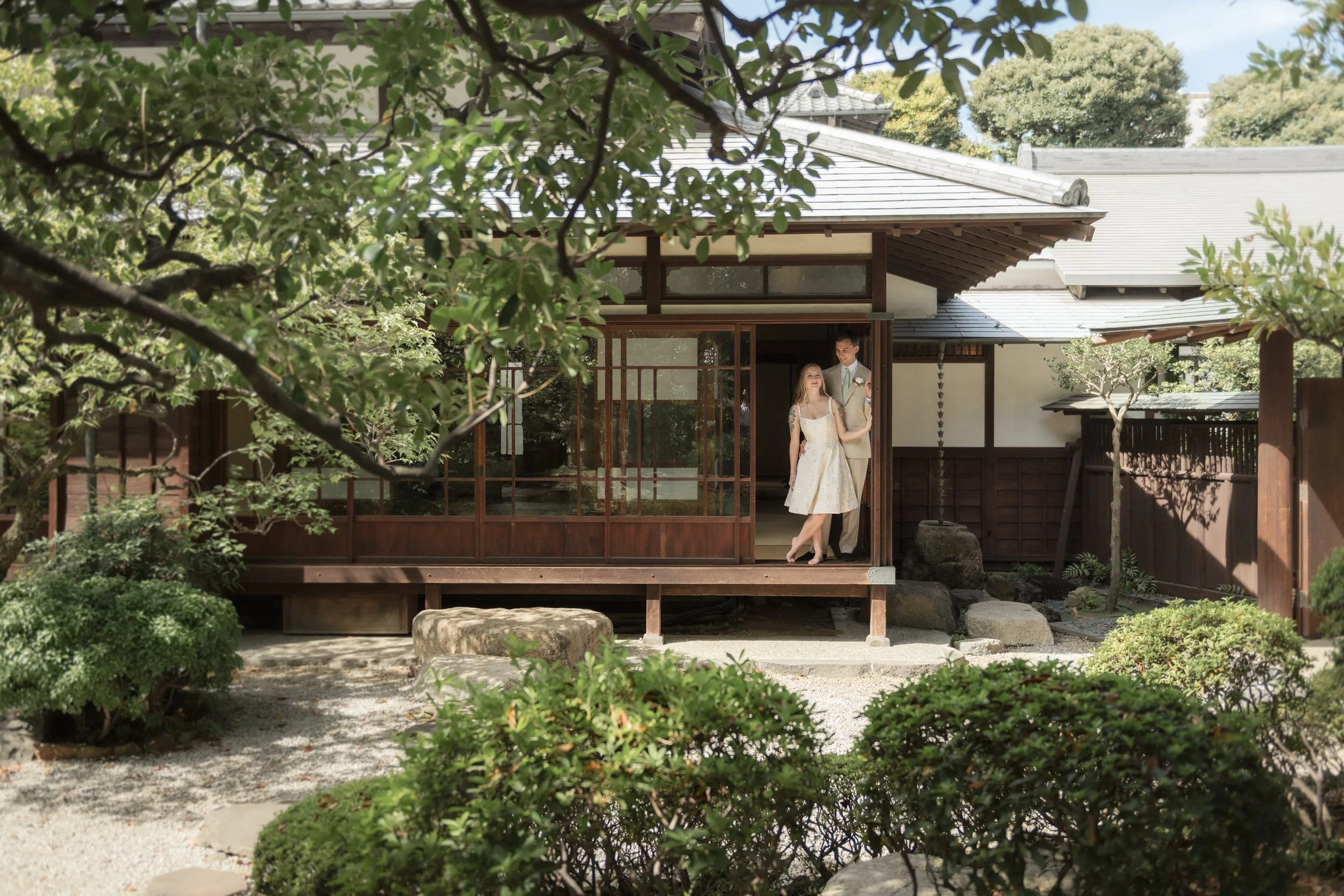Just married couple enjoy a beautiful private villa in Japan.