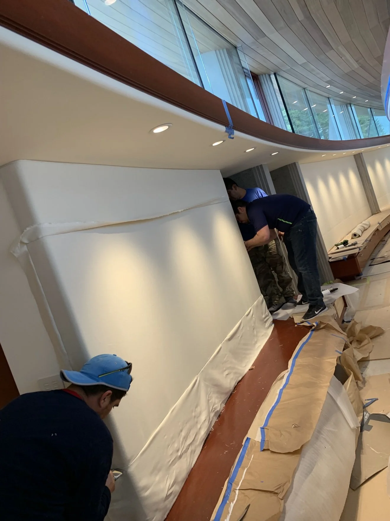 Whisper Wall panels installed below ceiling lights