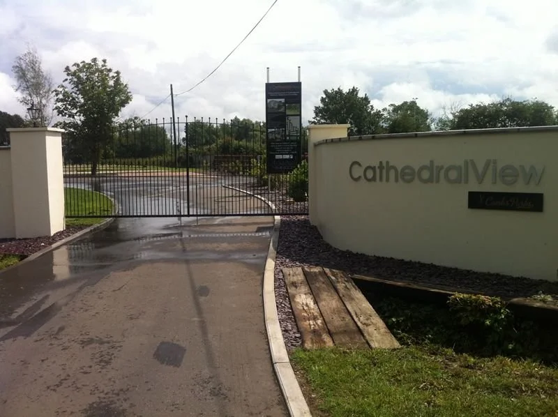 Entrance gate with a sign that reads 'Cathedral View'.