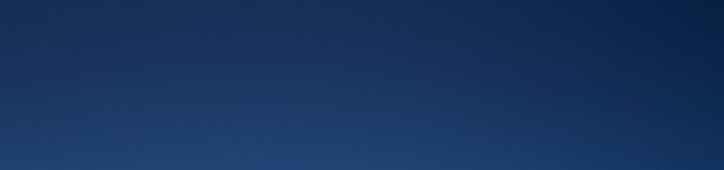 Dark night sky with no visible clouds or celestial objects.