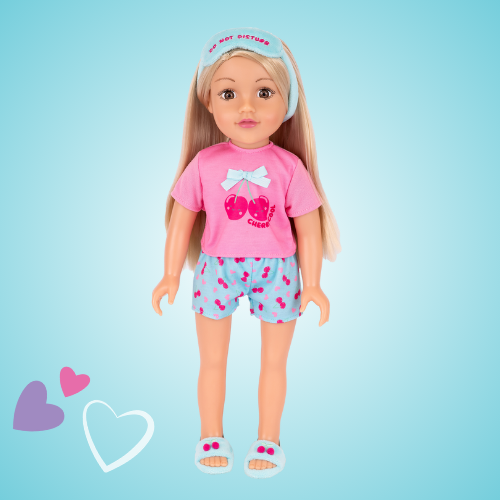 18 inch DesignAfriend doll with blonde hair, wearing cherry print pyjamas and slippers. Displayed on a turquoise background with playful hearts.