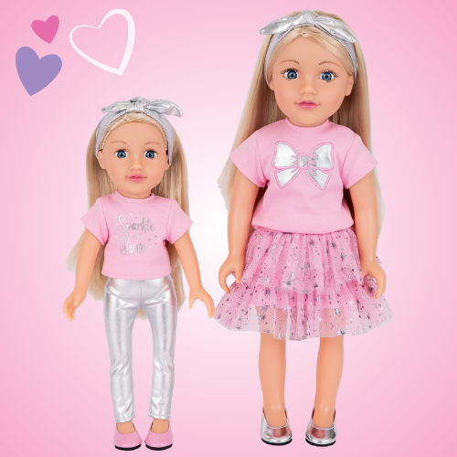 1 18 inch DesignAfriend doll and 1 14 inch Little Sister doll, both with blinde hair wearing pink and silver outfits. Displayed on a light pink background with playful hearts.