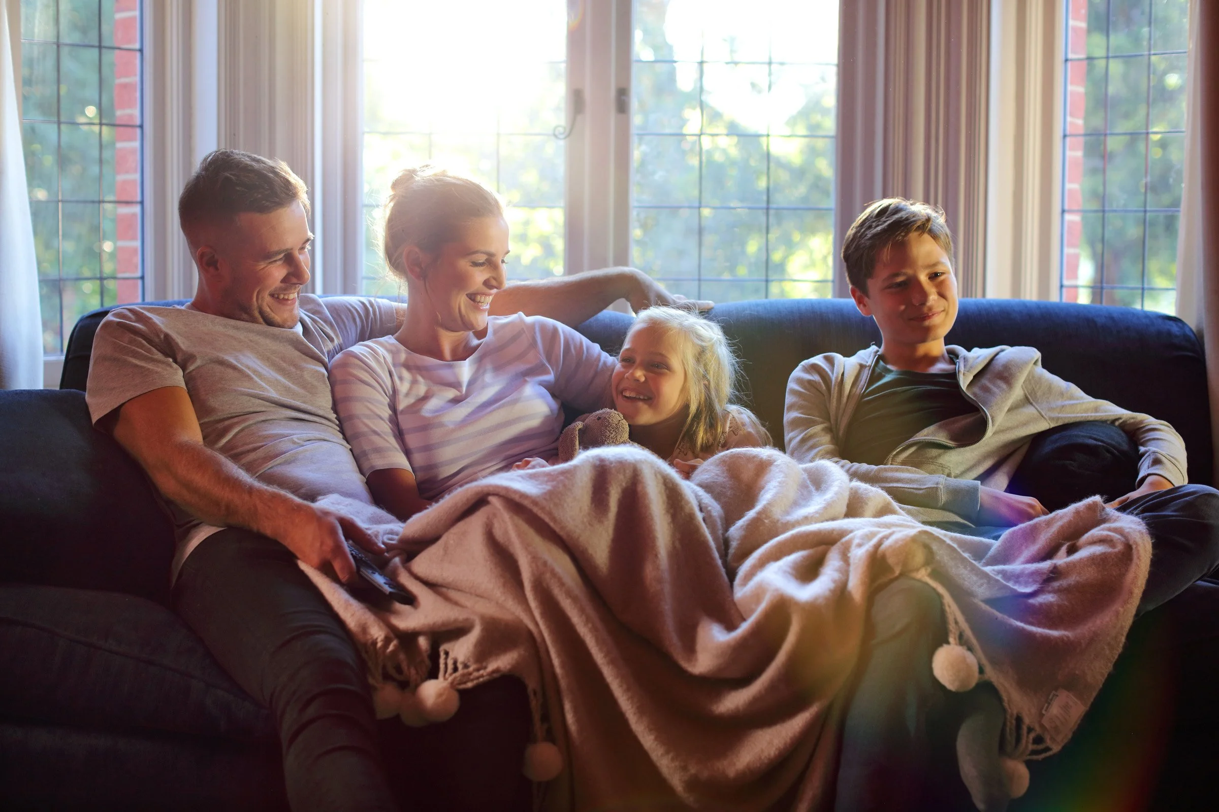 BT be there family on sofa