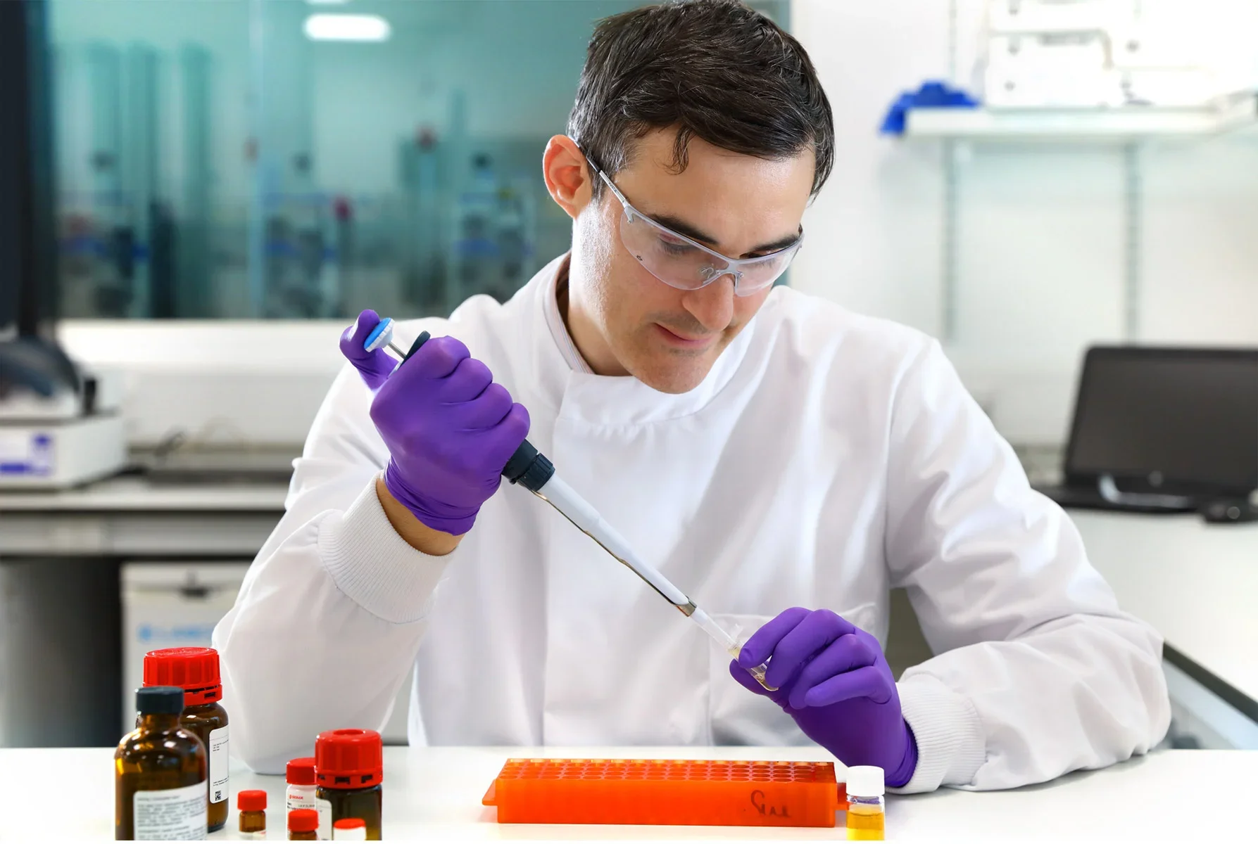 LifeArc scientist at work testing samples at the Stevenage campus