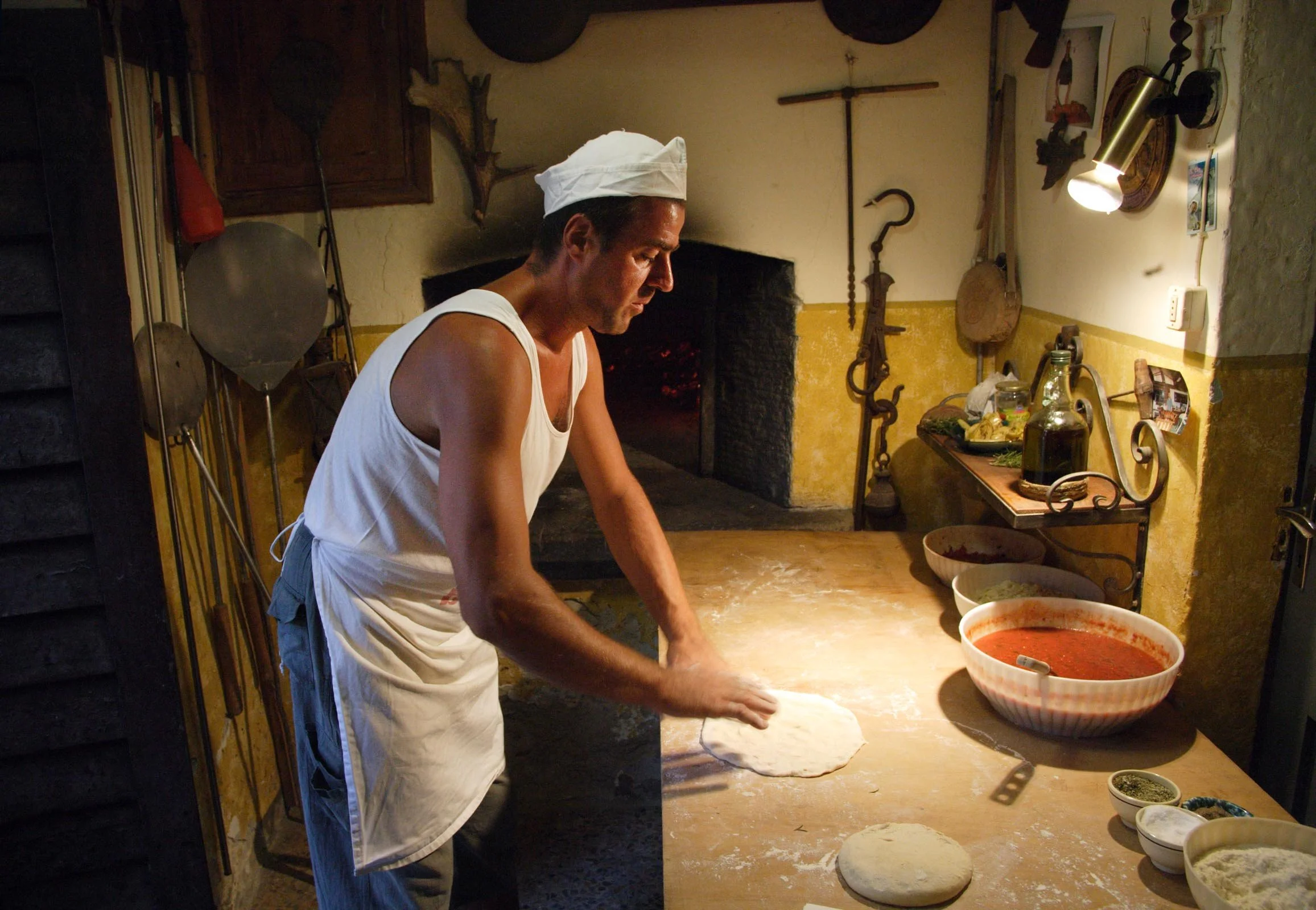 Carlo making Pizza by david Burton Photography