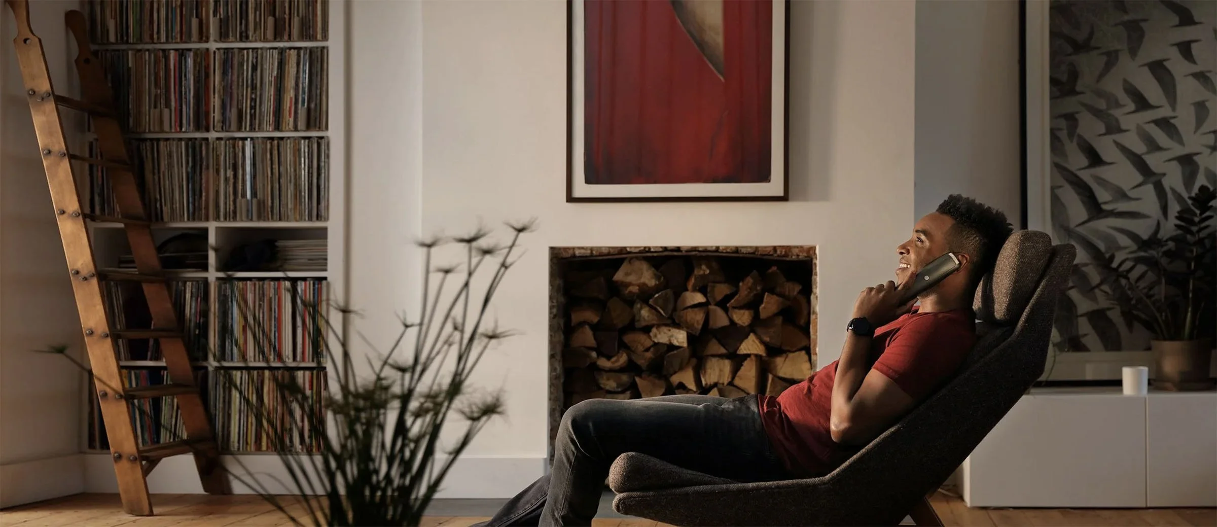 Man on telephone using Bt landline services, photographed by David Burton.