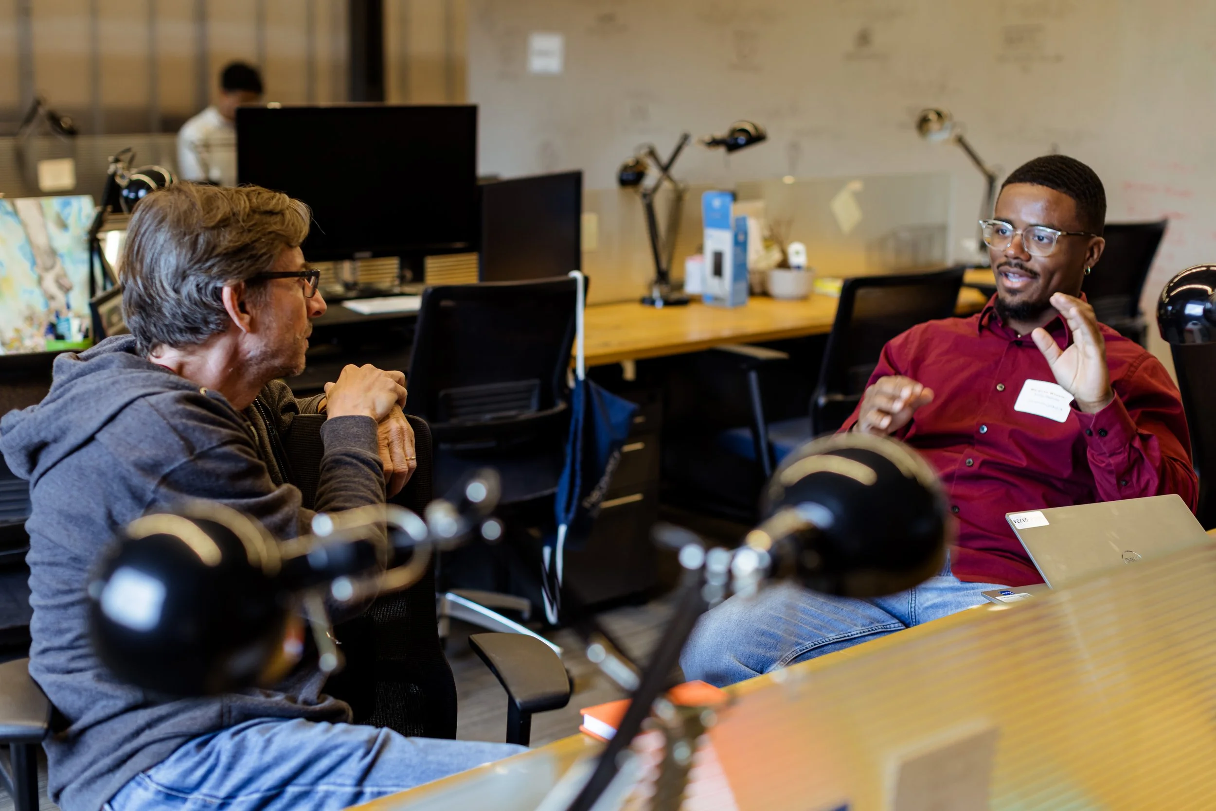 A photo of Ascender's people using flex desks