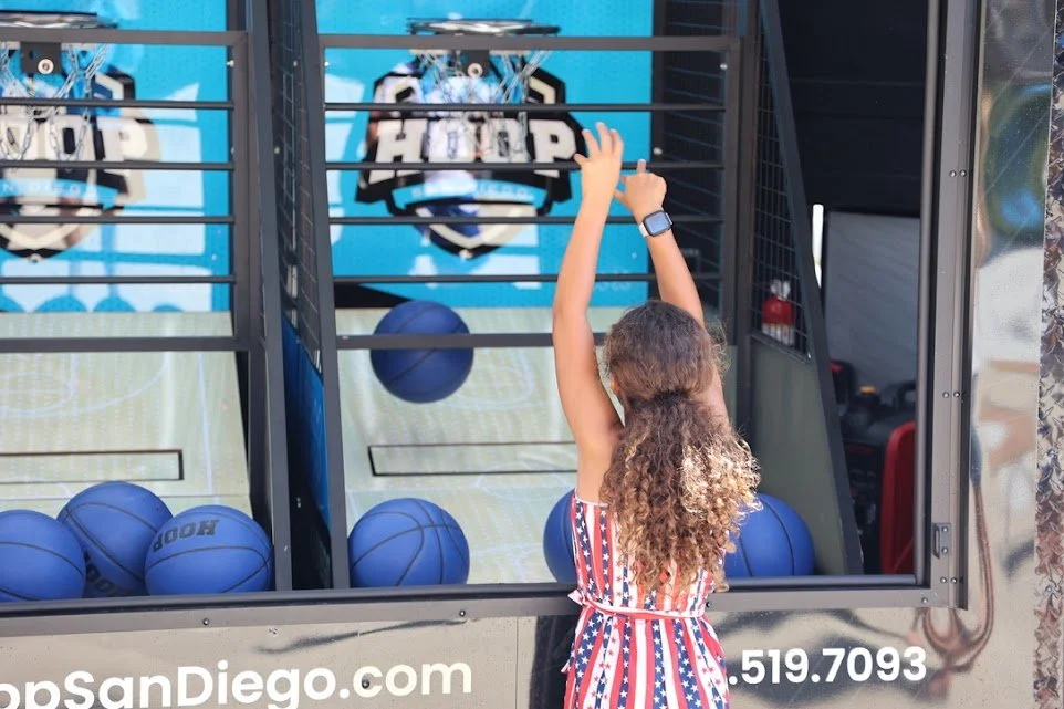 Hoop Houston: Make Your December Events Unforgettable with an Arcade Basketball Trailer