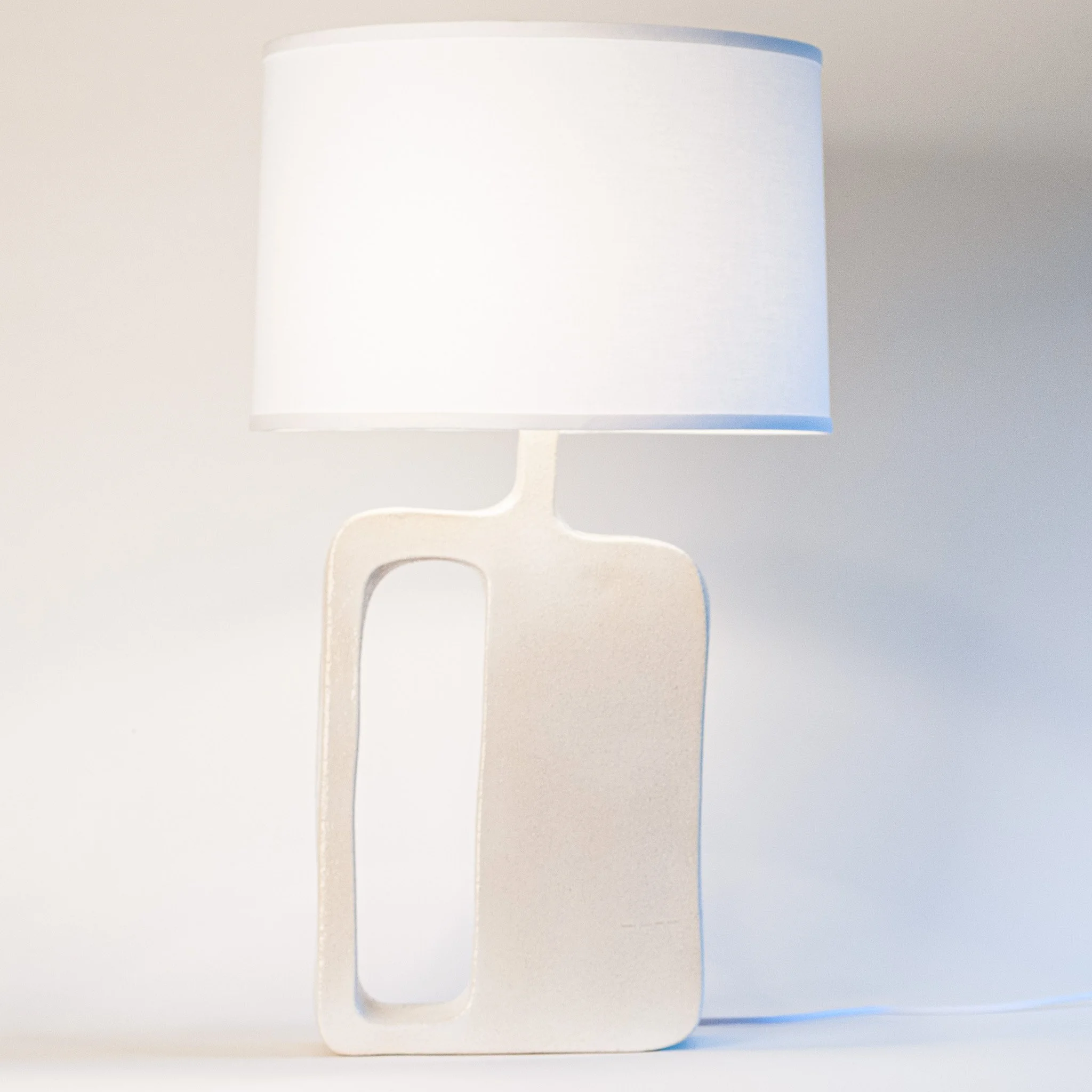 Form Study Table Lamp 2 by Jim Schatz — front with linen shade