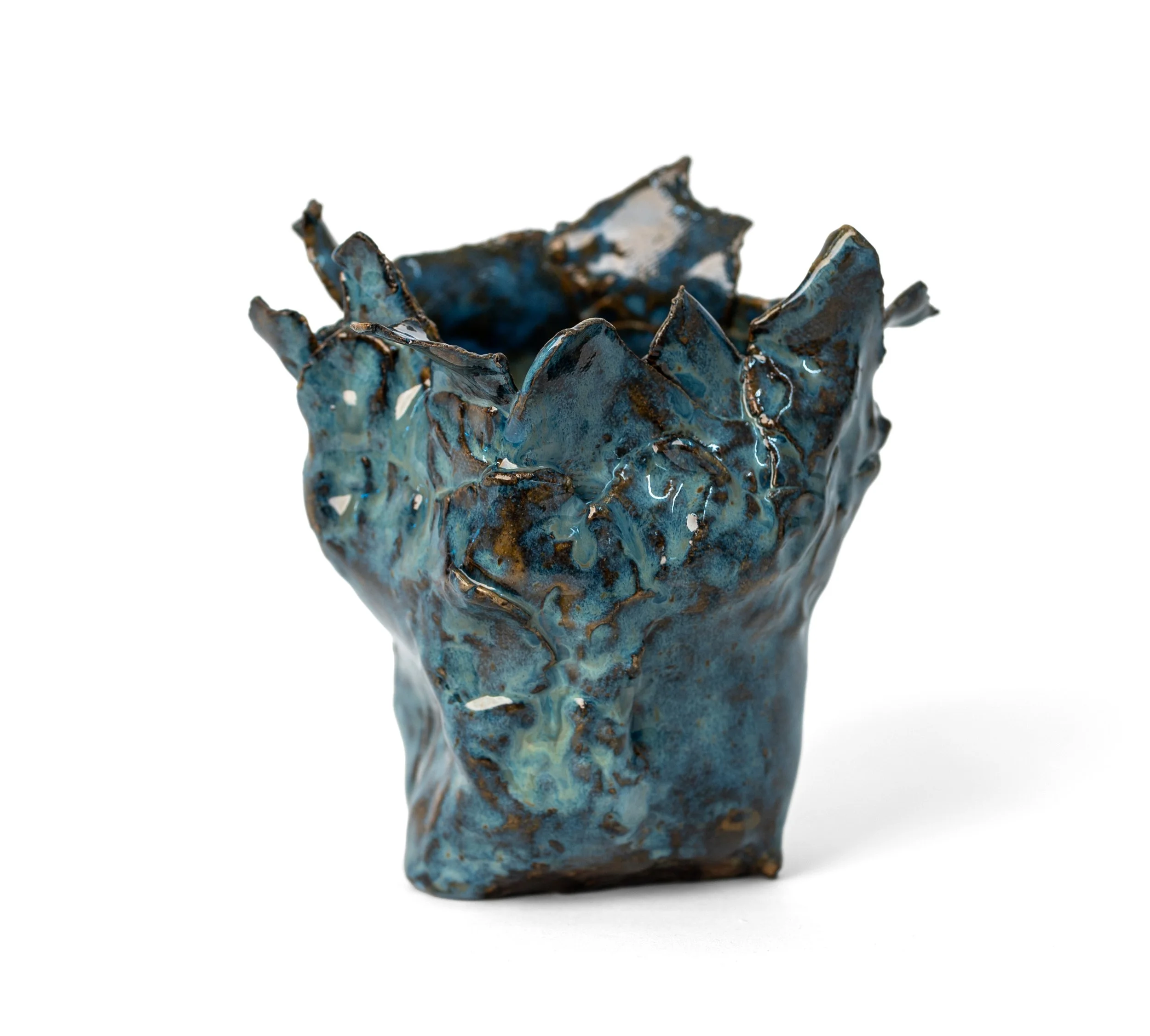 Vessel 5, alternate view of the crumpled body and torn peaks in mottled blue glaze, by Peter Souza Jr.