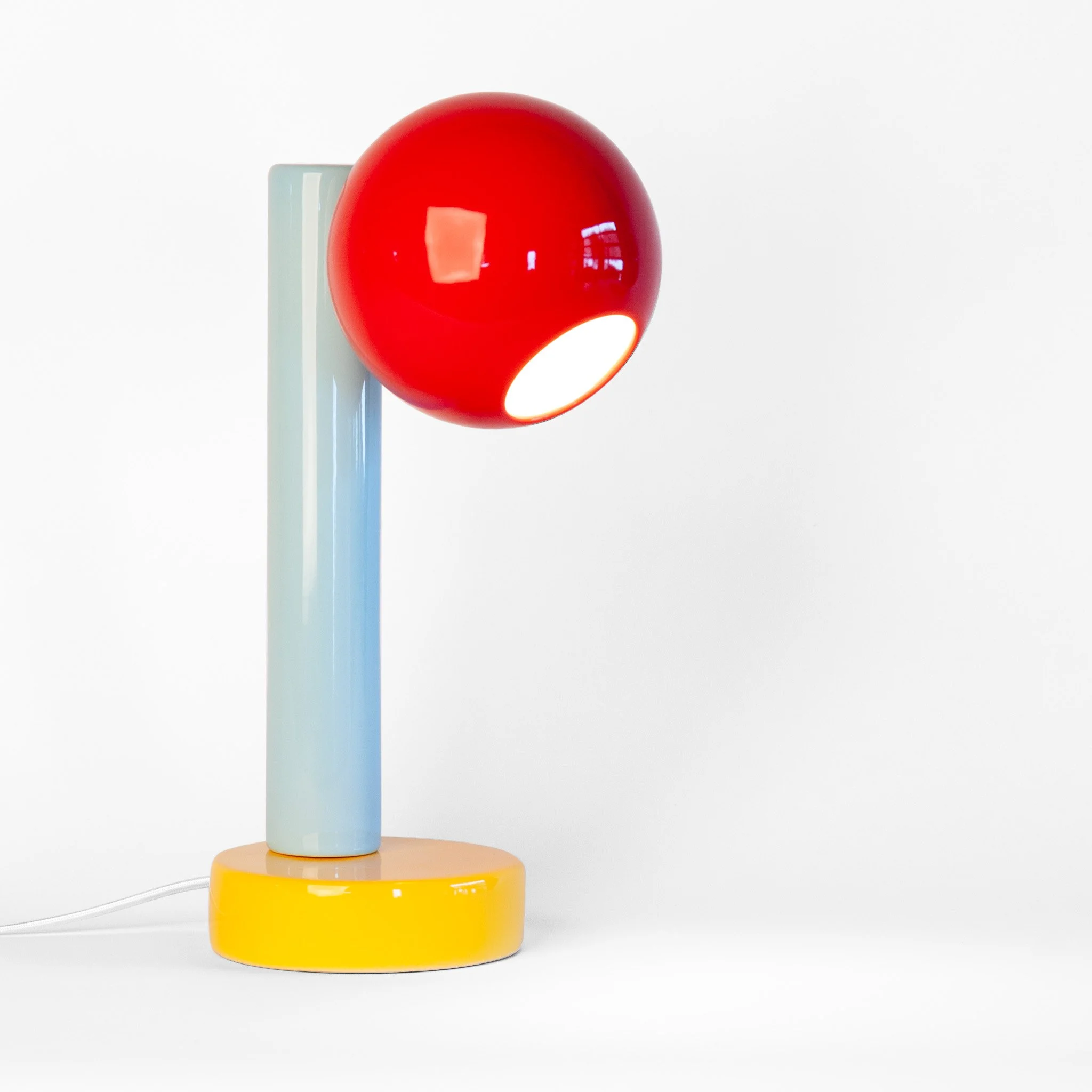 Spot On Desk Lamp in Sumac Red, Light Aqua, Goldenrod Yellow by Jim Schatz with J Schatz Studio — front