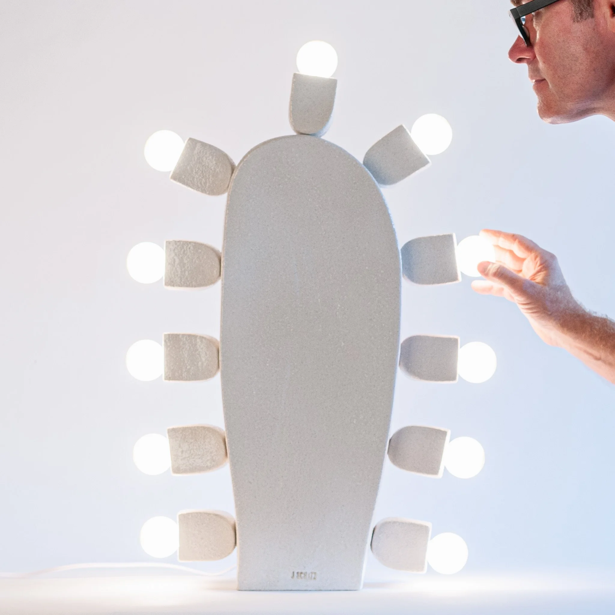 Cactus Lamp 1 detail — textured white stoneware surface