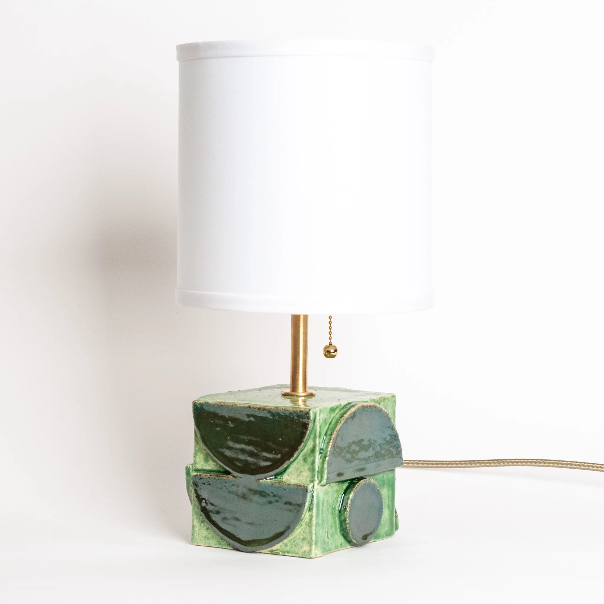Geometria Table Lamp by Jim Schatz — Sage Green angle