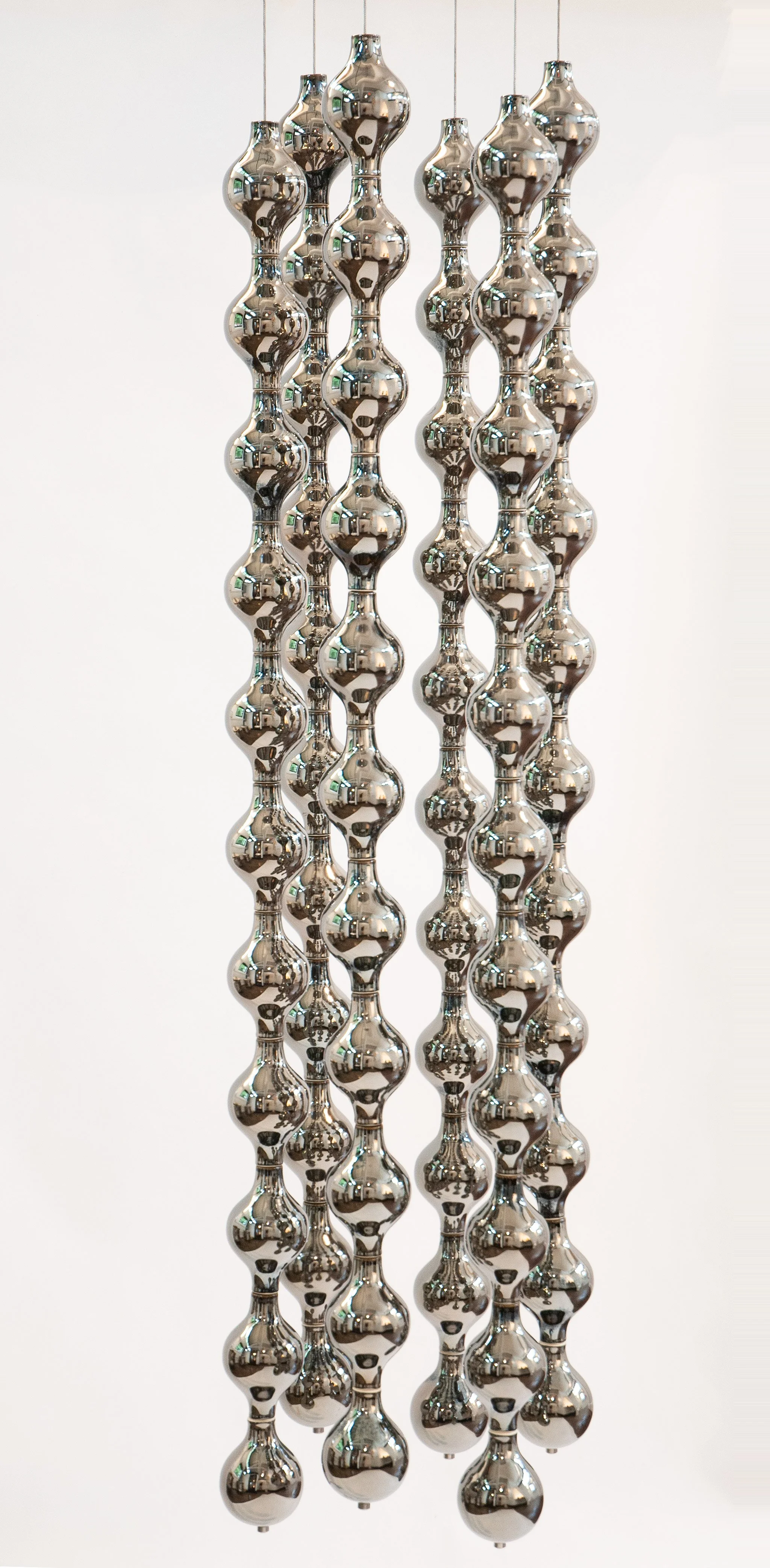 Happening Circle, suspended ceramic composition in platinum lustre by Jim Schatz, full view