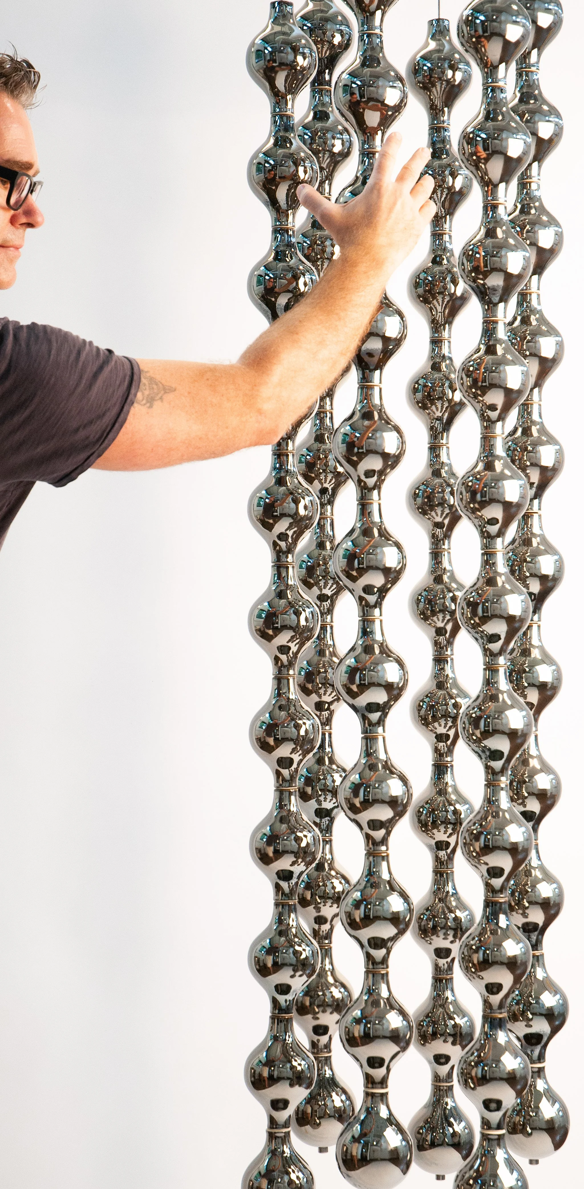 Happening Circle, install with hand for scale