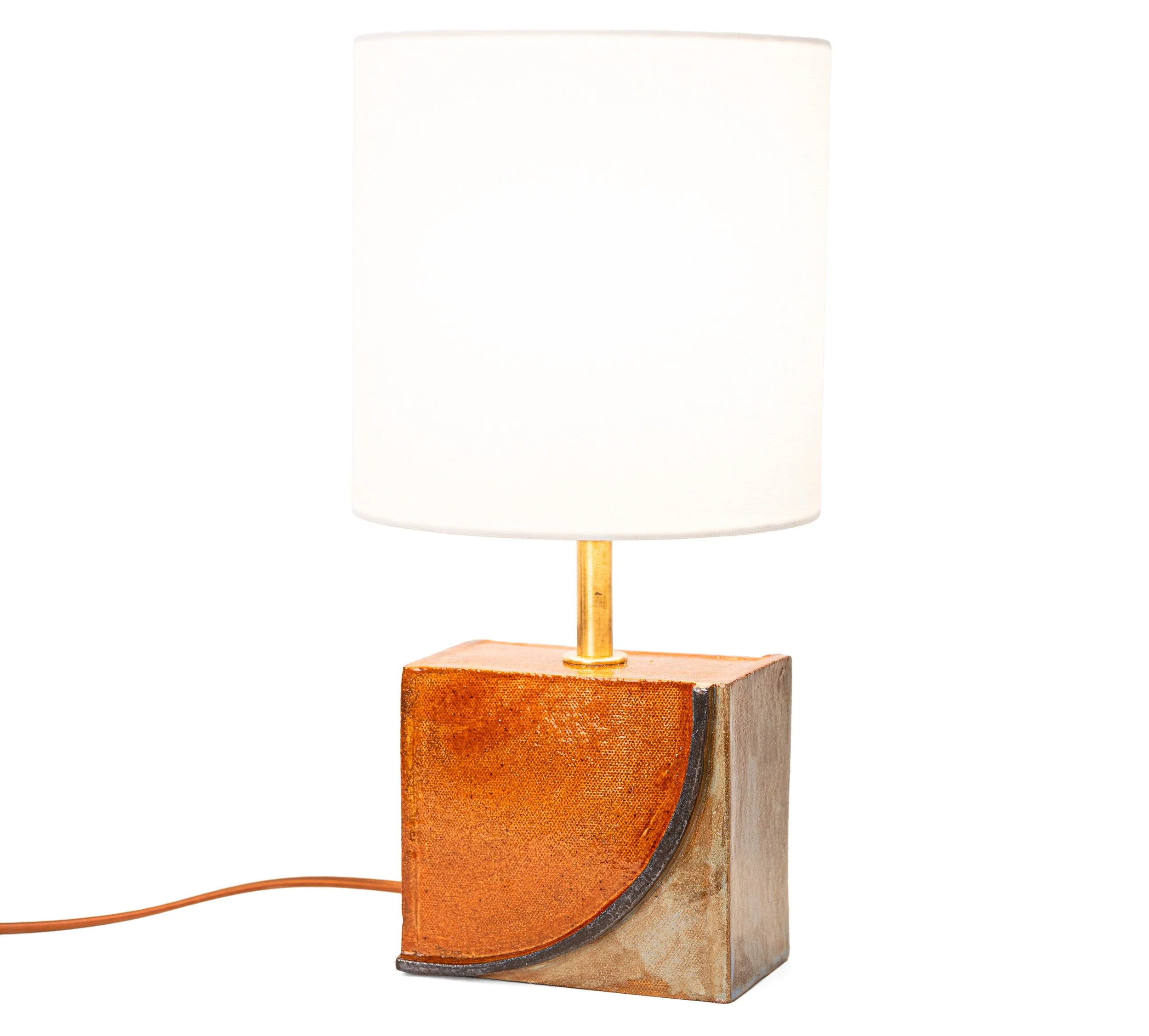 Geometria Brick Lamps, Lamp 2, a rust quarter arc on grey glazed stoneware, by Jim Schatz.