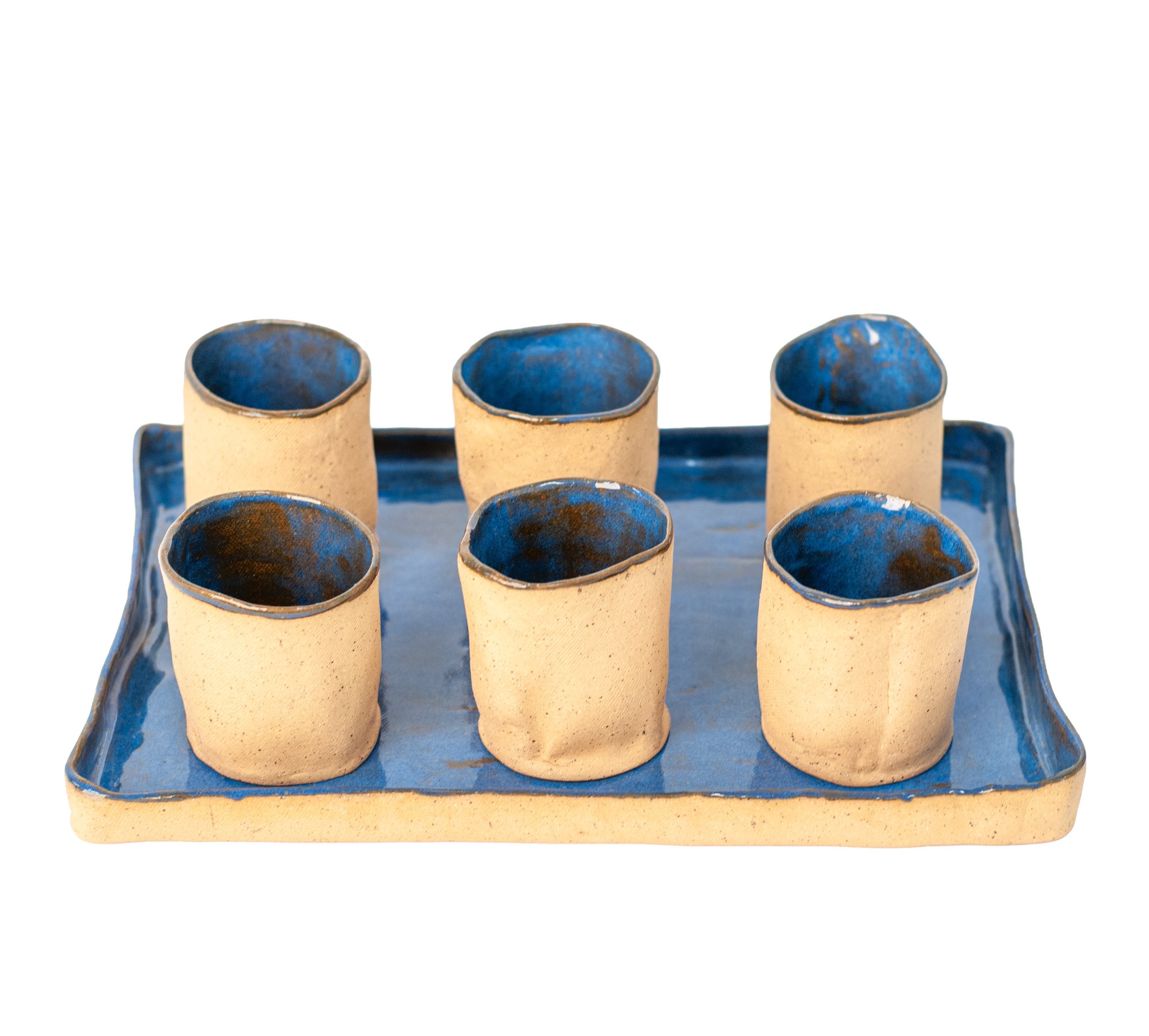 Tray and Six Cups, detail view of cobalt blue glazed cup interiors and tray surface