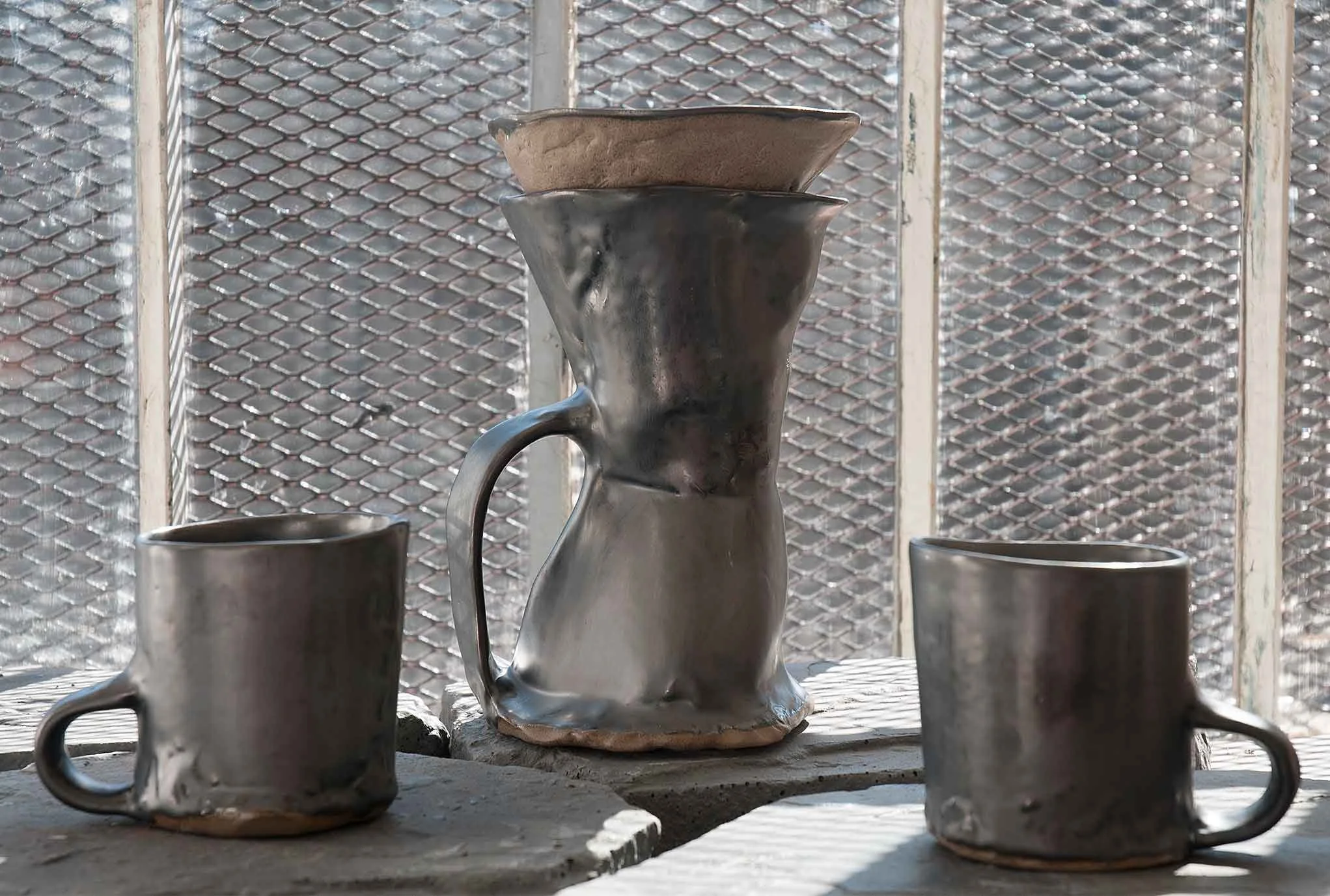 Brutal Coffeemakers and Mugs, set in studio