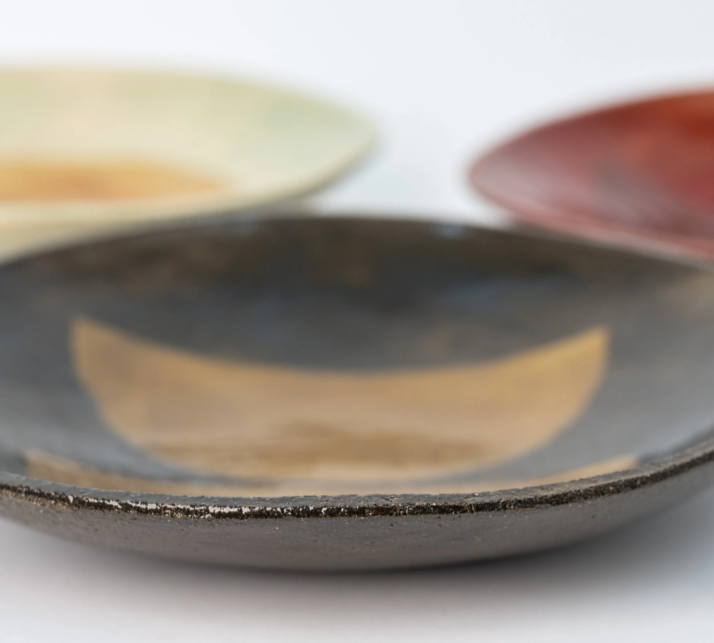 Geometria Bowls, 28 over 12 in front, glazed stoneware bowls by Jim Schatz