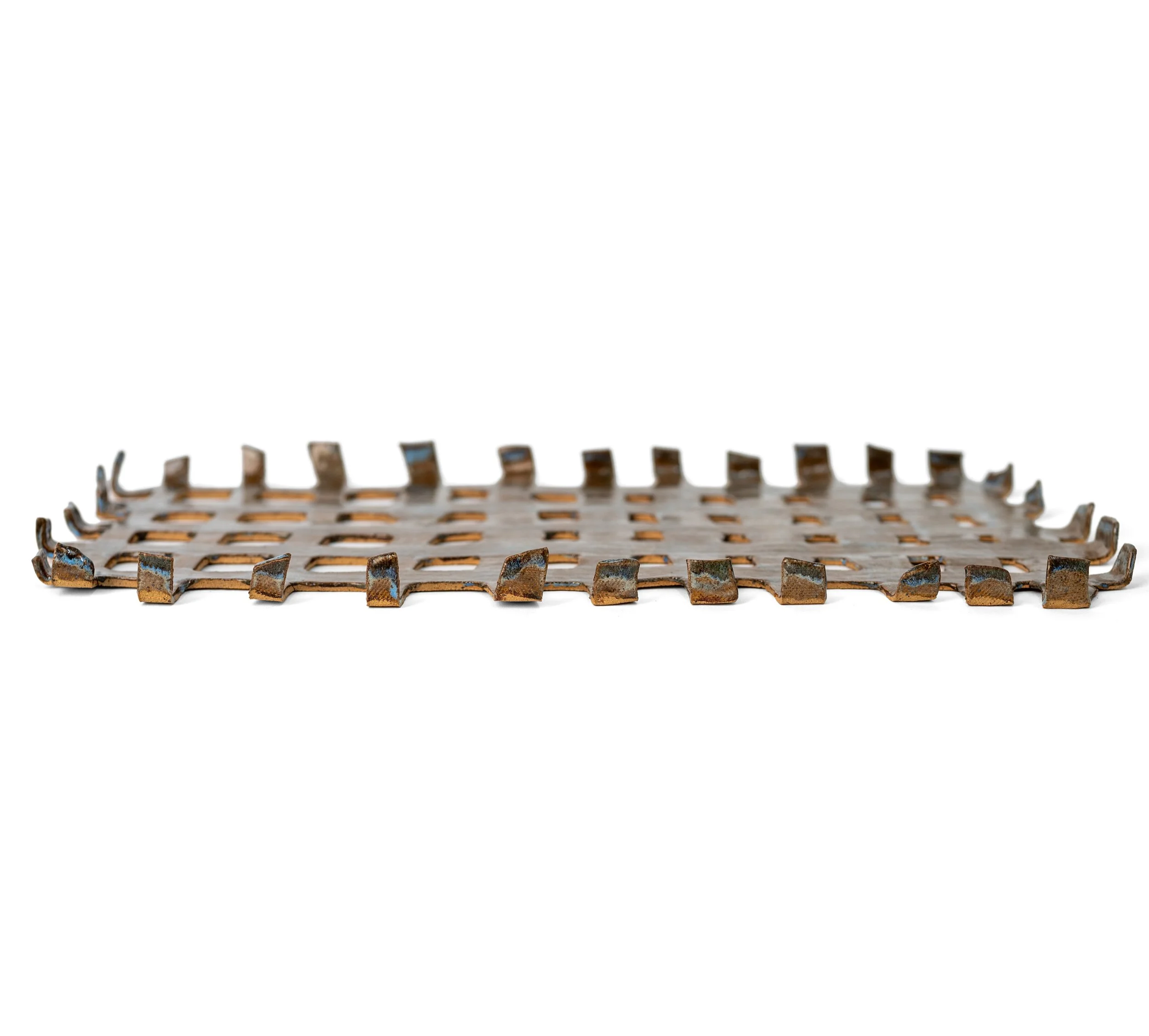 Woven Tray 1, side view of the low woven grid, glazed strip ends over raw speckled clay edges, by Peter Souza Jr.
