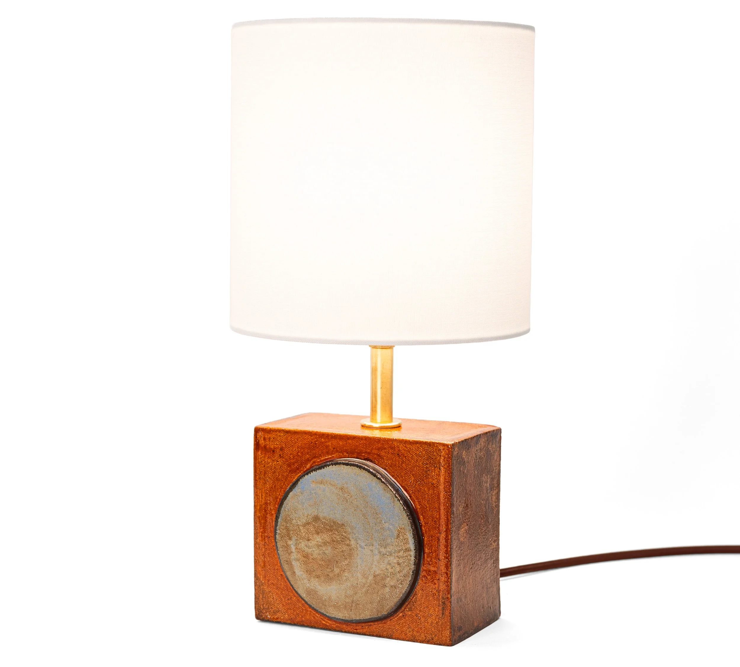 Geometria Brick Lamps, Lamp 1, a blue-grey disc set into rust glazed stoneware, by Jim Schatz.