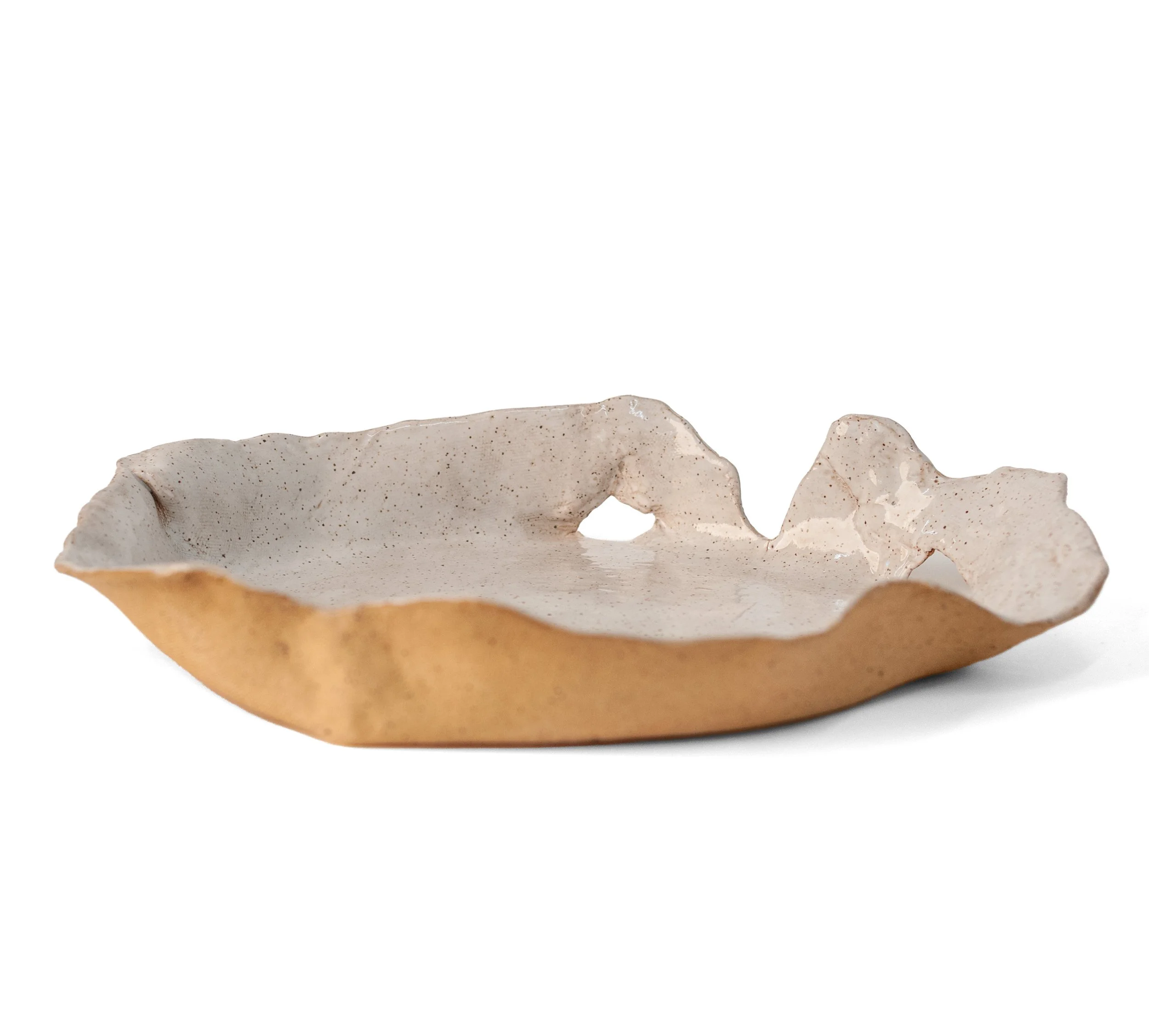 Bowl, side view showing raw speckled stoneware exterior and rising folded rim