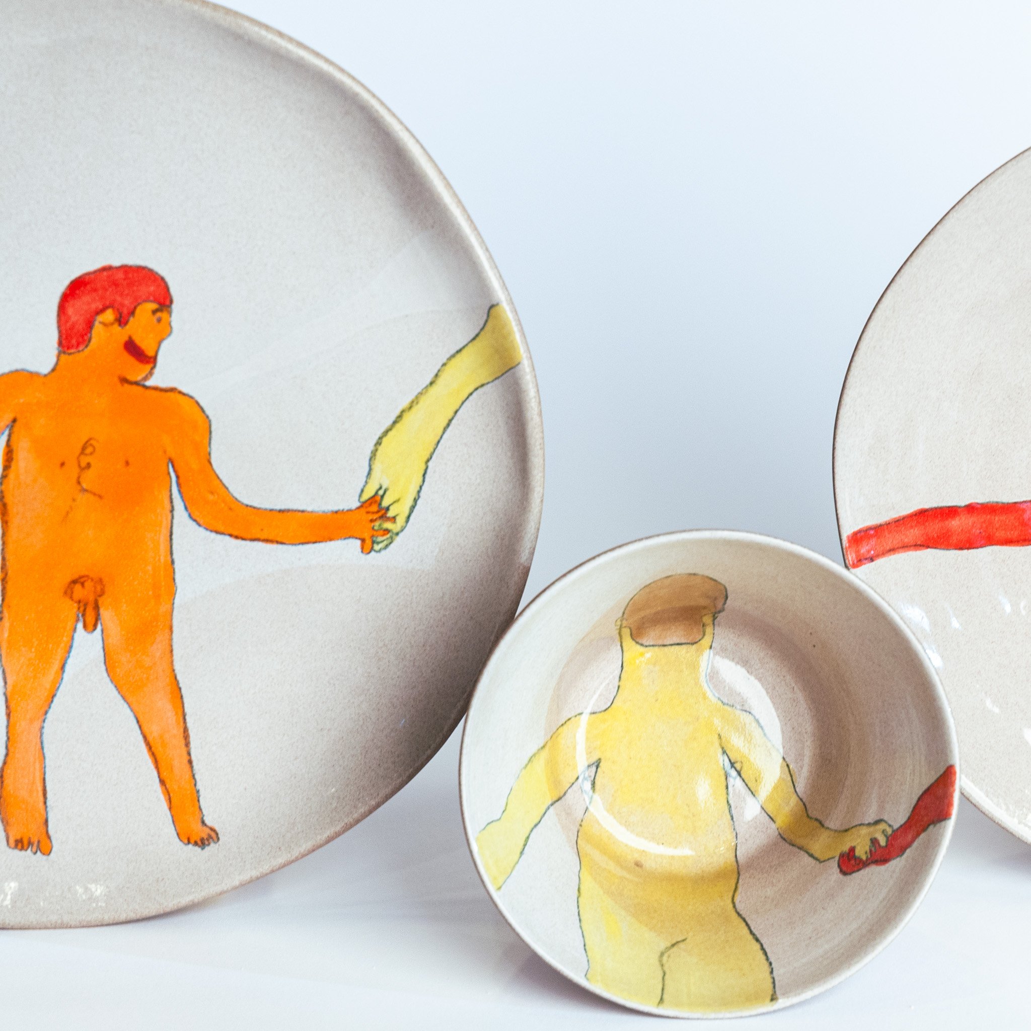 All Together Now by Jim Schatz — Sam, Bill, Tito, Keith & Zach, hand-painted stoneware place setting  — dinner plate, figure in orange