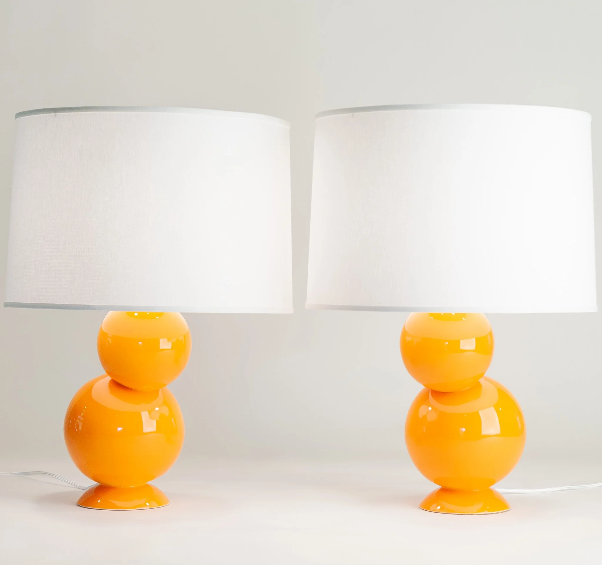 Bubble Lamp Pair in Orange Peel by Jim Schatz with J Schatz Studio — front, two lamps with linen shades