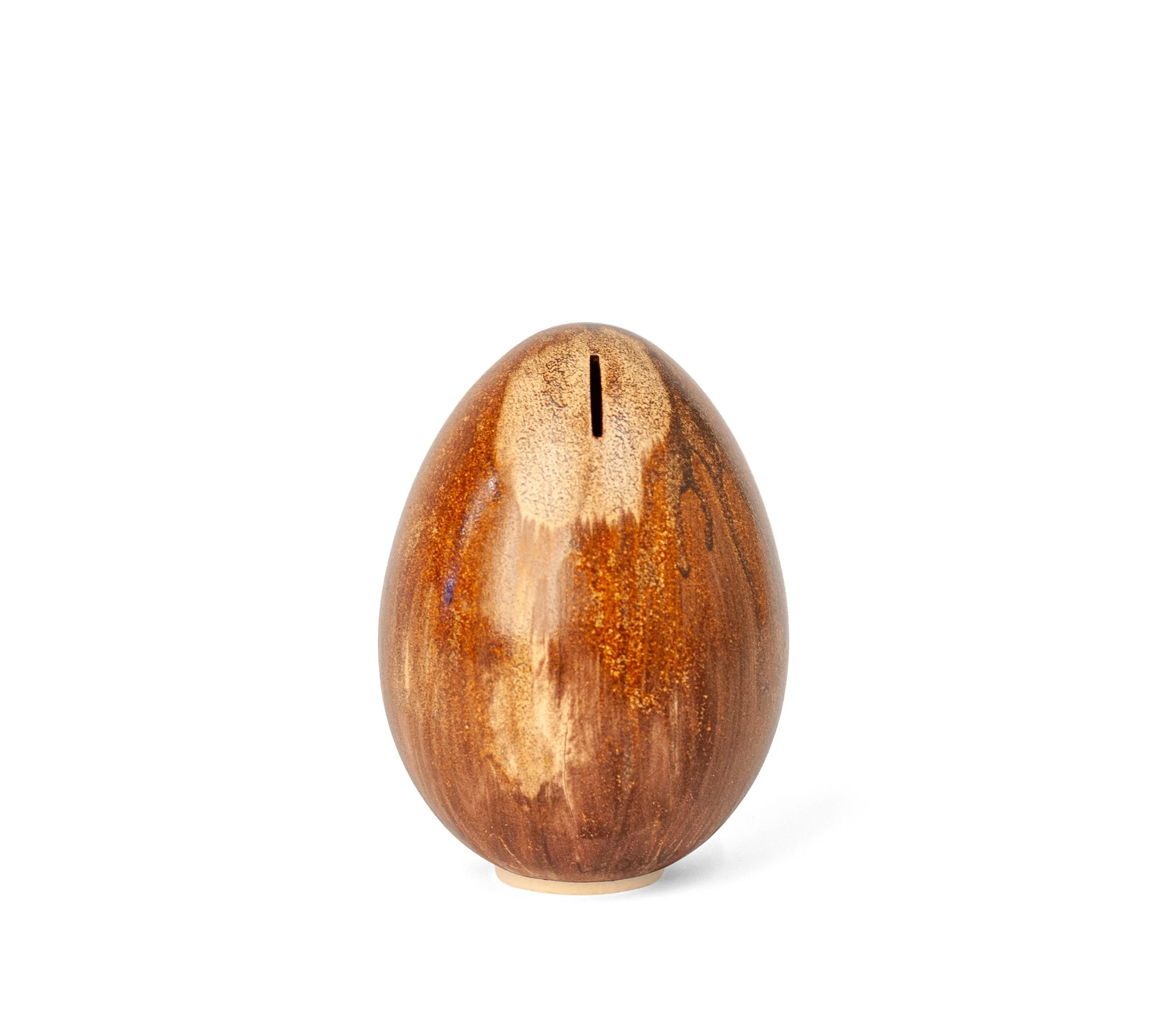 Egg Bank in rustic glaze, 2026, ceramic coin bank by Jim Schatz with warm brown and amber glaze and coin slot at top