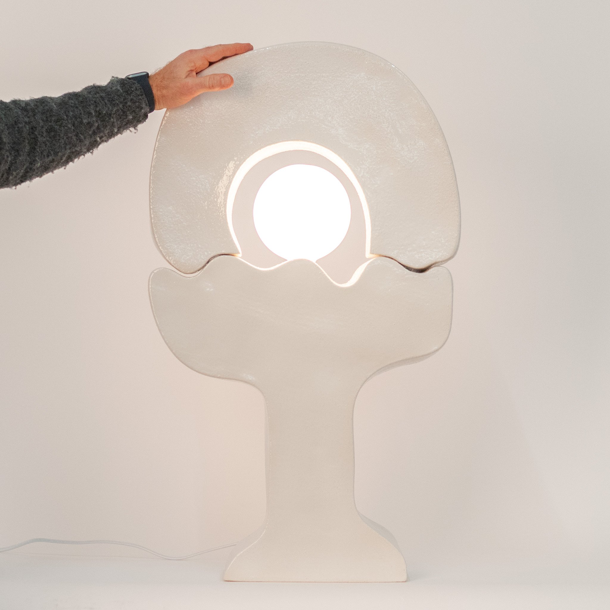 Cactus Lamp 4 by Jim Schatz — artist hand for scale