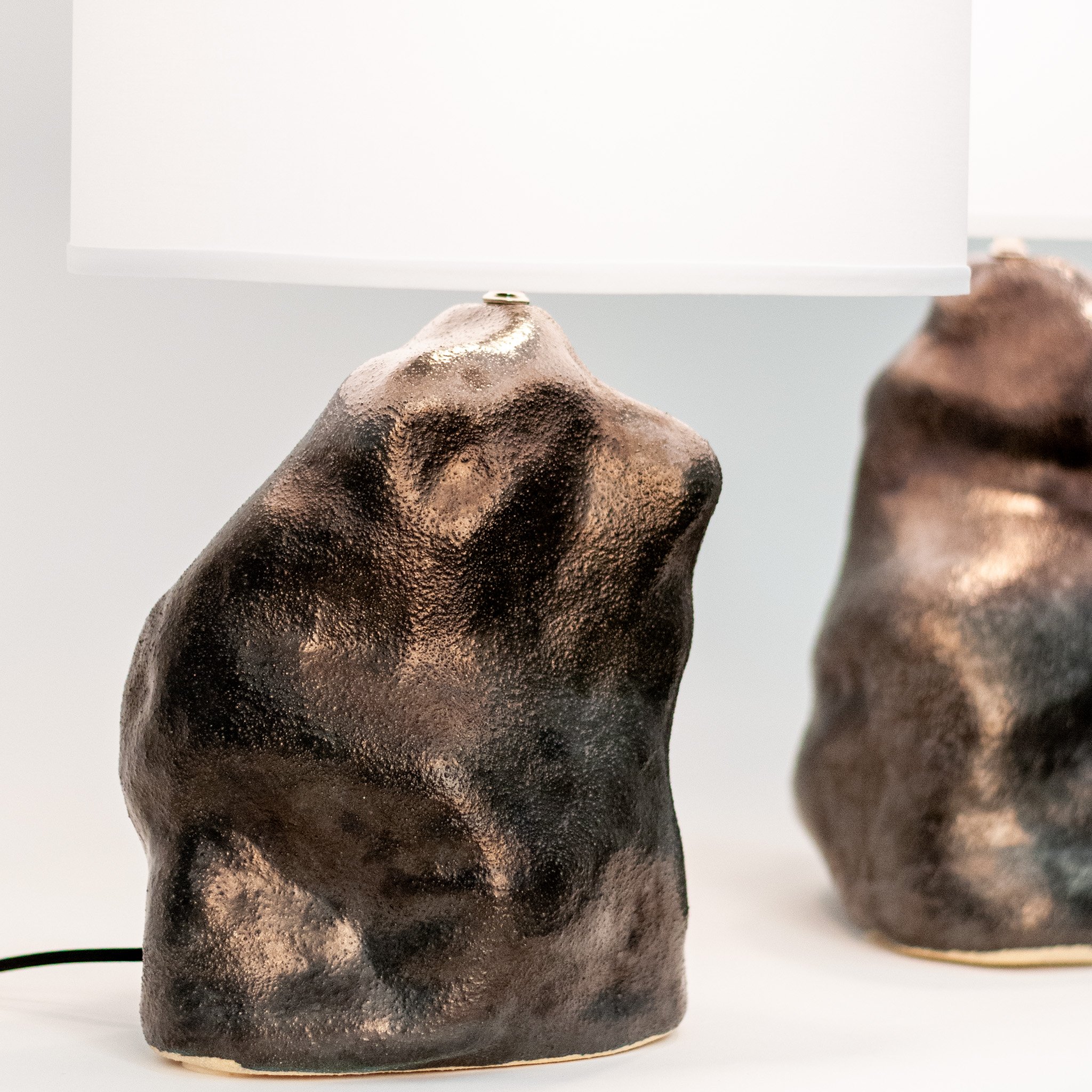 Metallic Black Amorphous Lamp Pair by Jim Schatz — base detail showing metallic surface