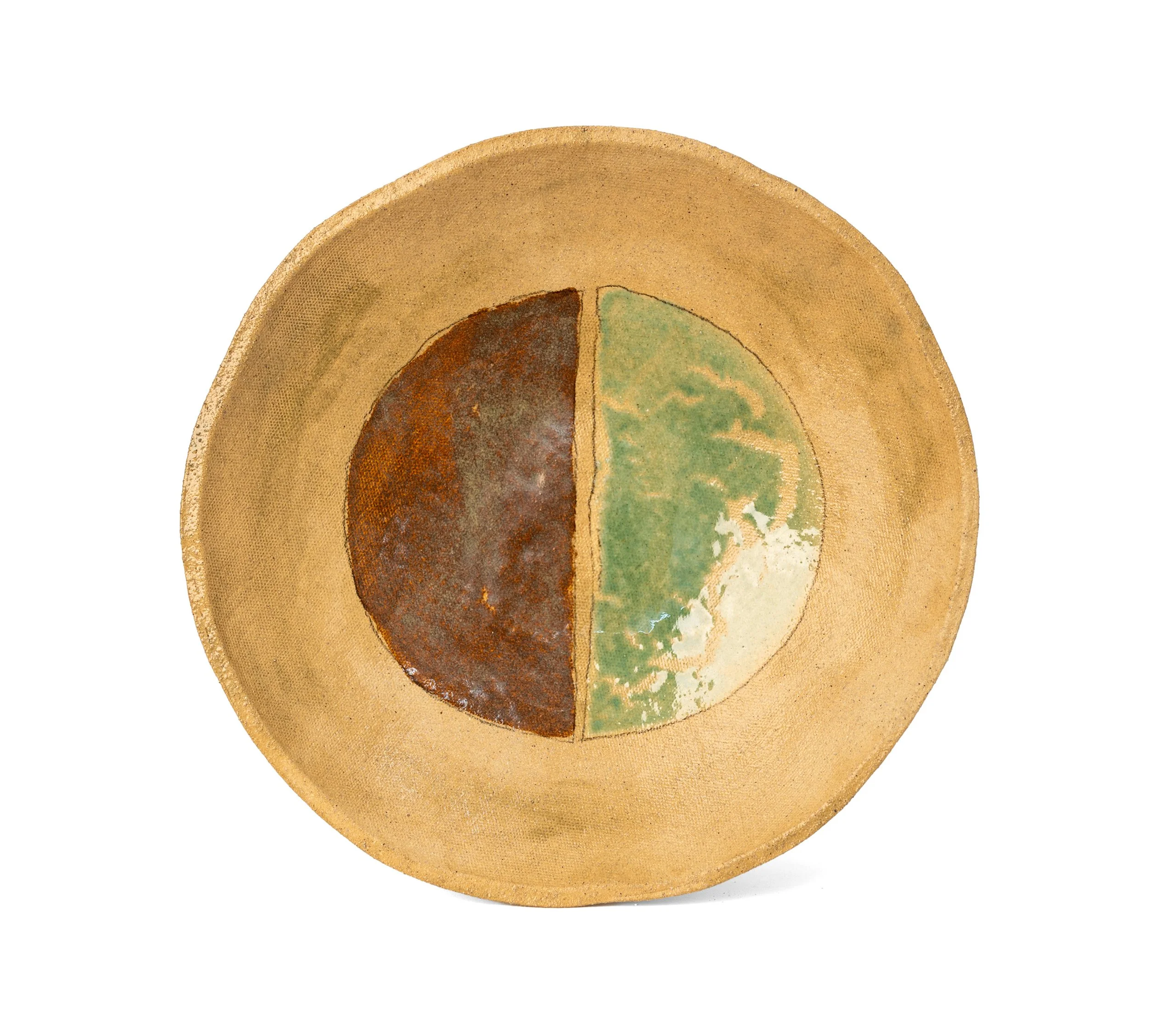 Geometria Bowl, 33/40 over 25, sand-colored stoneware bowl with a split disc in brown and green, by Jim Schatz