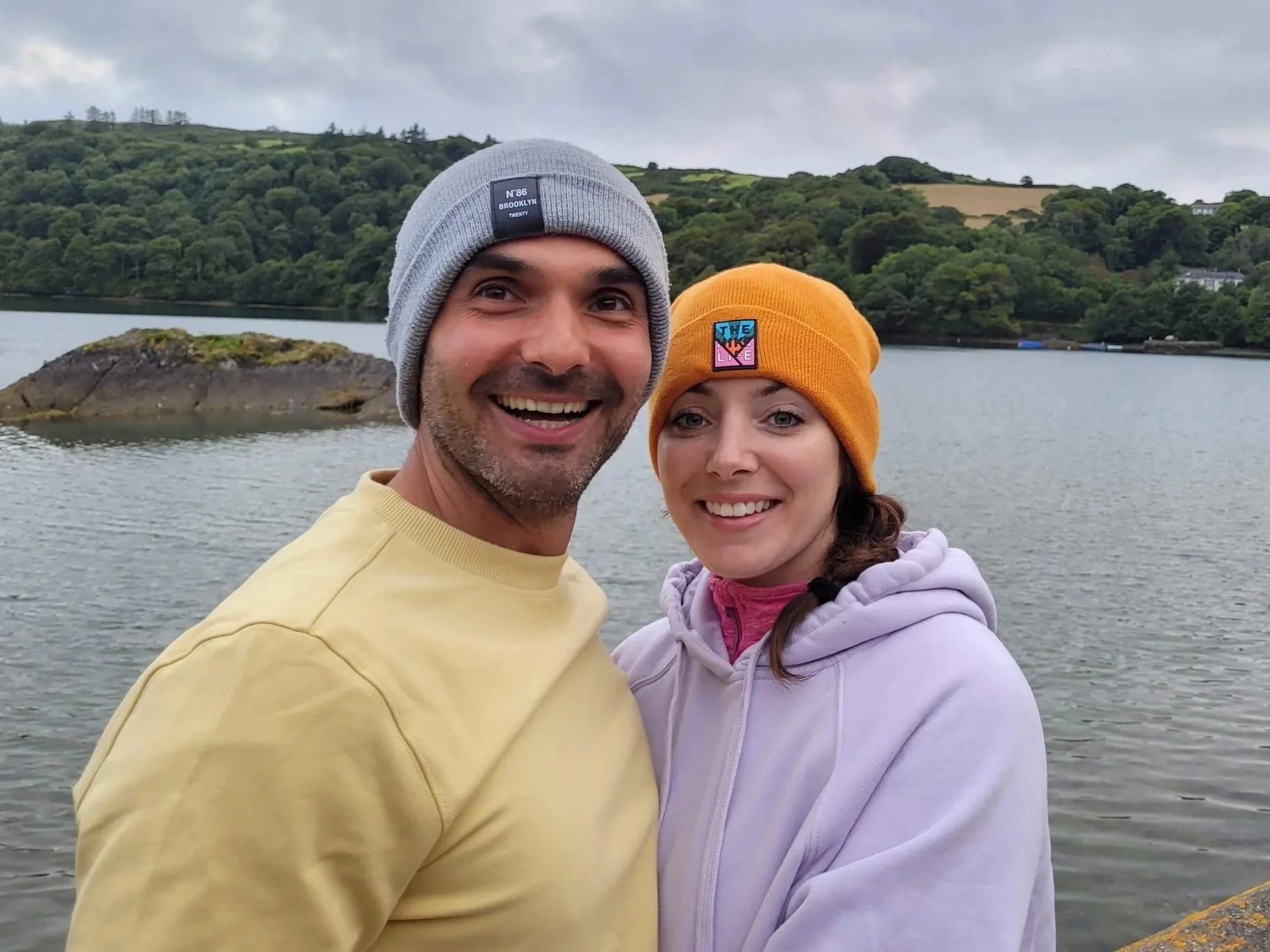 Alana and Andrei, founders of Andala Wellness, together beside a lake.