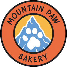 Logo of Mountain Paw Bakery featuring a mountain and a paw print.