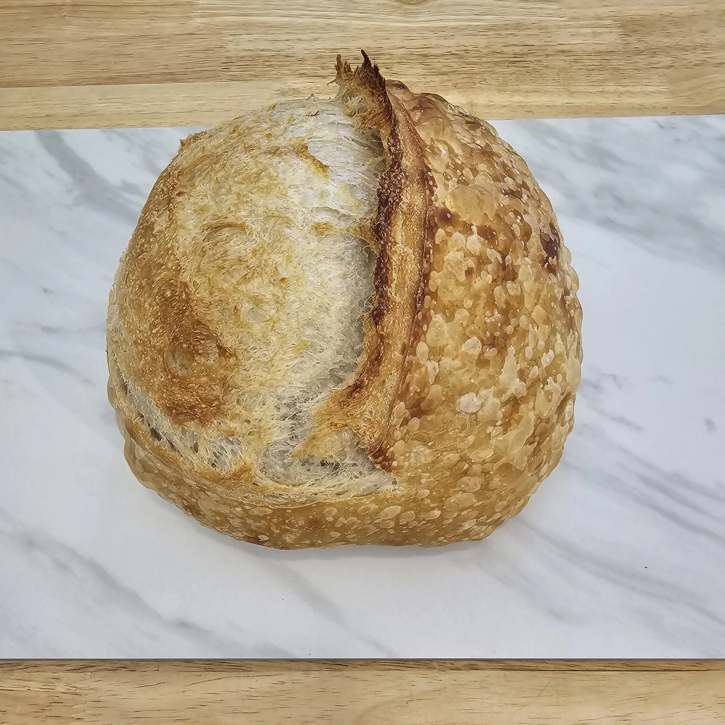 Our original sourdough — just organic flour, water, and salt. Pure, simple, and made with care. Choose a full or half loaf. 