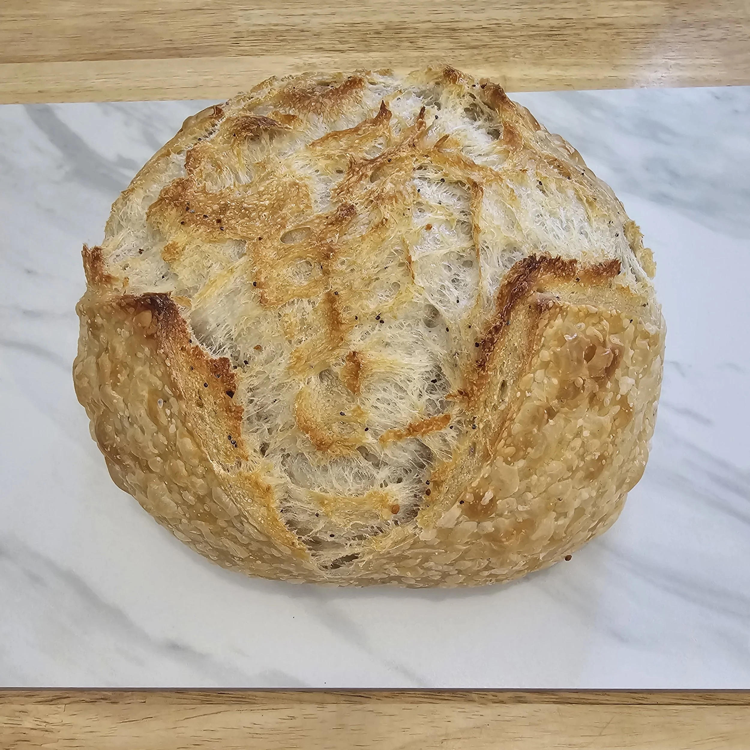 Everything: Our original sourdough topped with classic everything bagel seasoning — savory, toasty, and full of flavor.