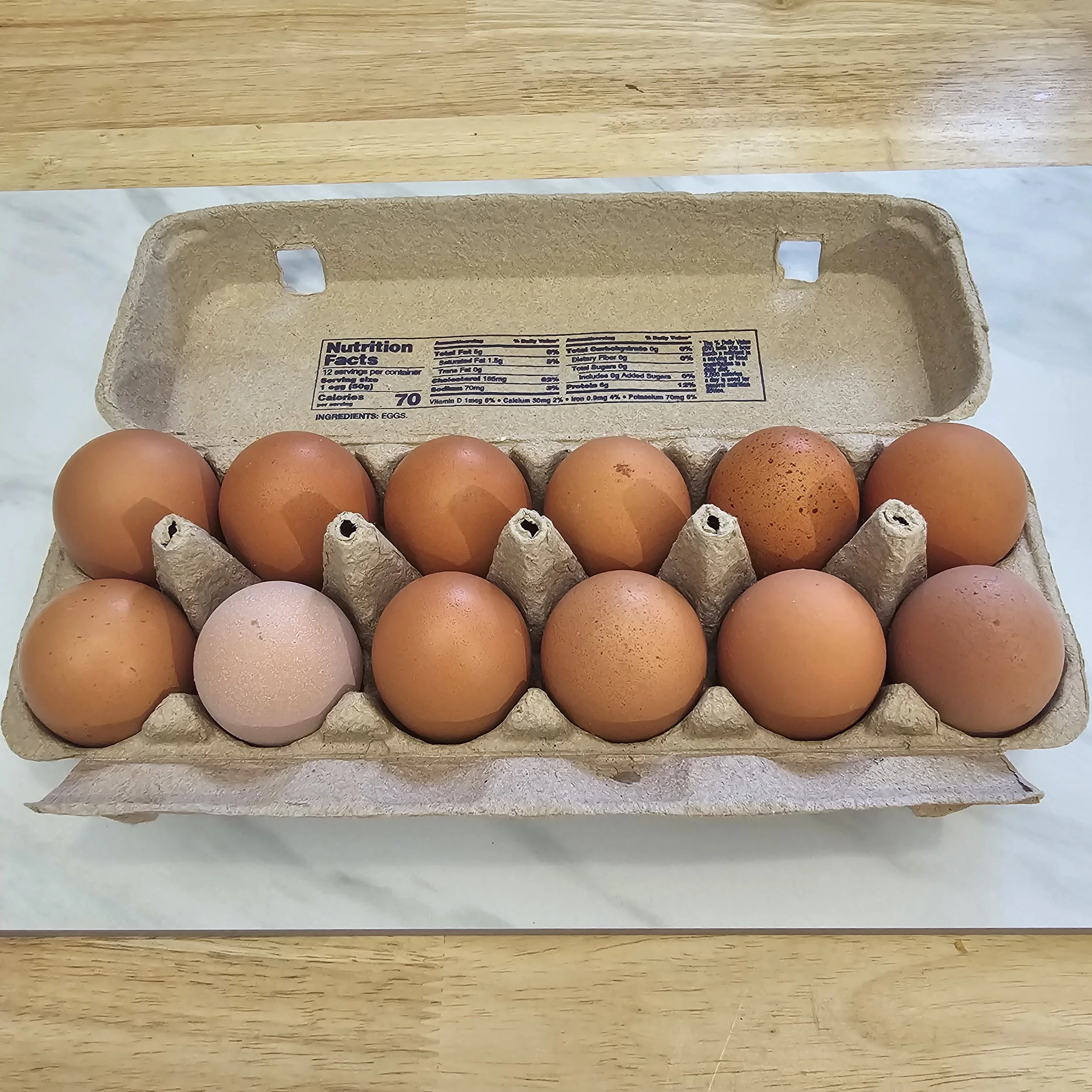 Large Eggs: Laid by happy hens that spend their days roaming our large open pasture, these organic eggs have rich orange yolks, sturdy shells, and farm-fresh flavor. Available washed or unwashed.