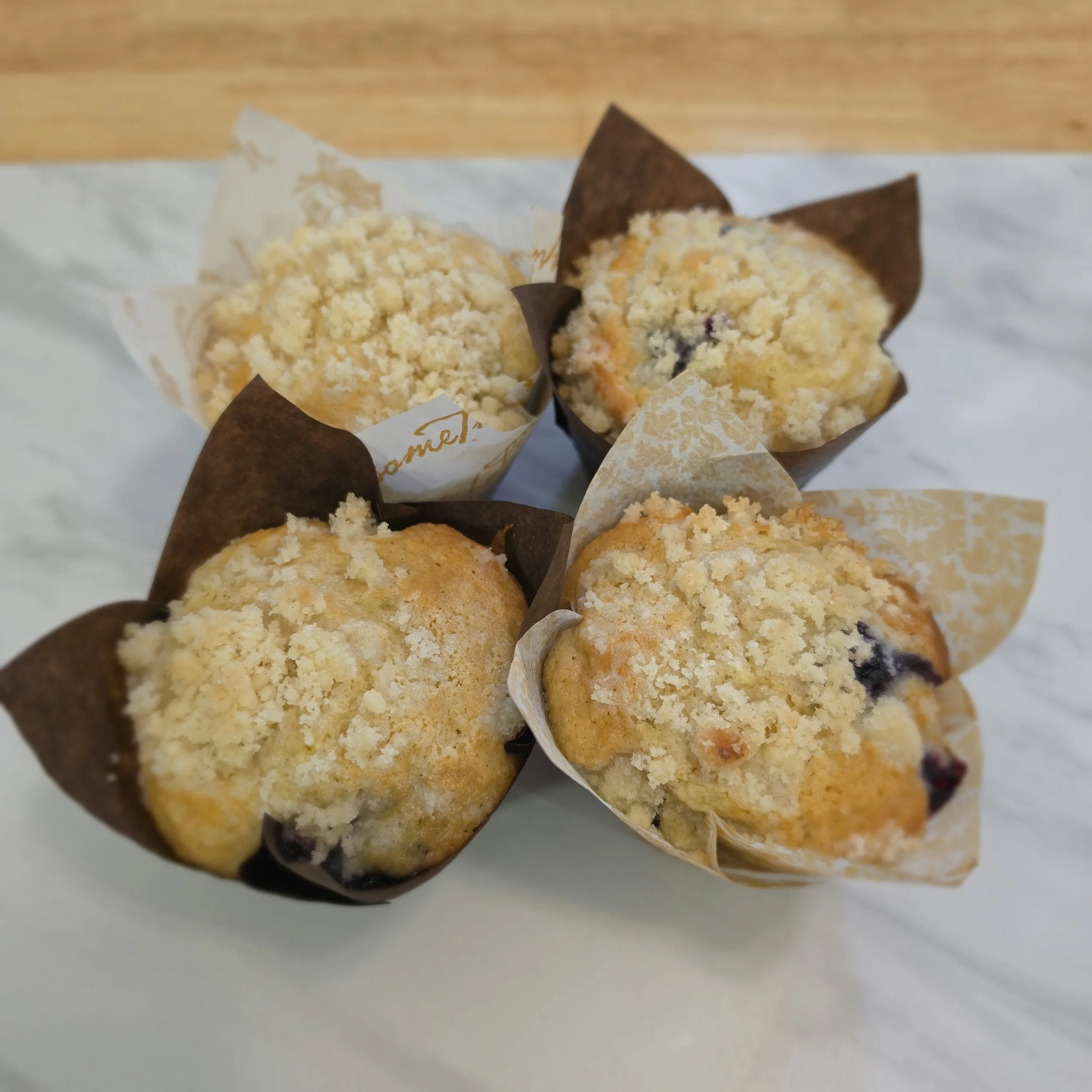 Blueberry Crumble Muffins: Filled with fresh blueberries and topped with a buttery crumble, these sourdough muffins bring a touch of homemade goodness.