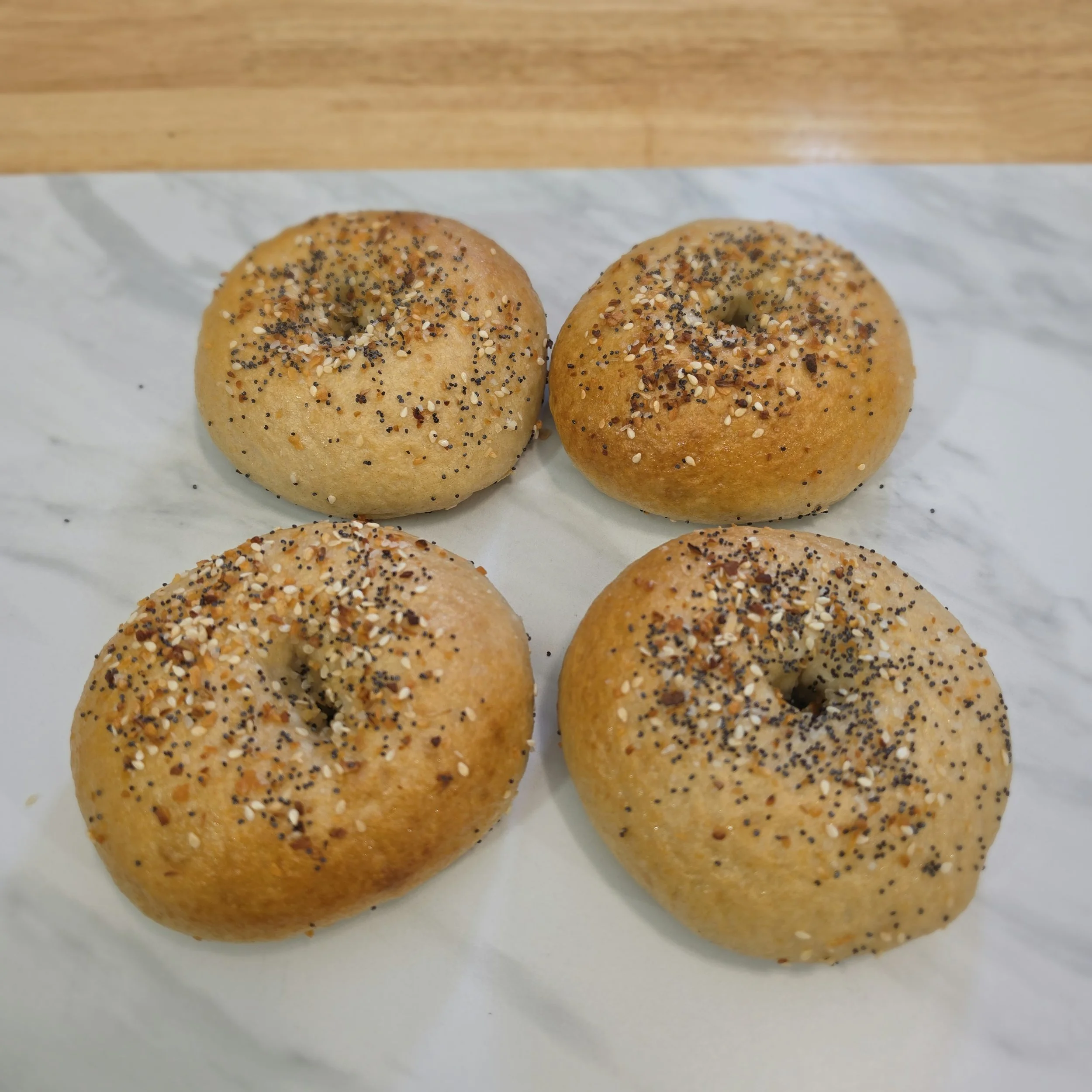 Bagels: Naturally leavened and baked fresh, these sourdough bagels bring the comfort of a bakery breakfast to your own kitchen.