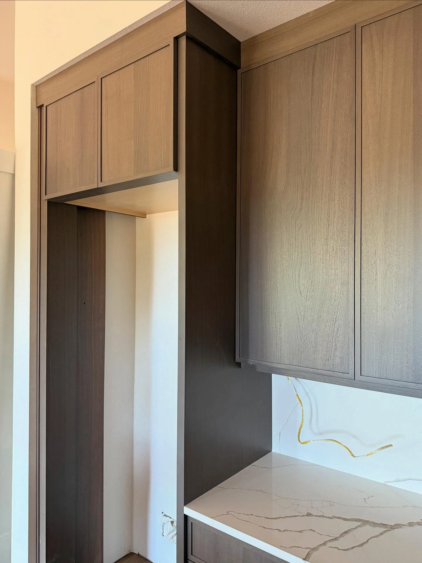 I&rsquo;m so glad for clients that agree it&rsquo;s fun to try new things 😁 Right now I&rsquo;m really loving the new slim shaker door profile, and this subtle stain that softens the tone of natural walnut juuuust enough. This home&rsquo;s entire ca