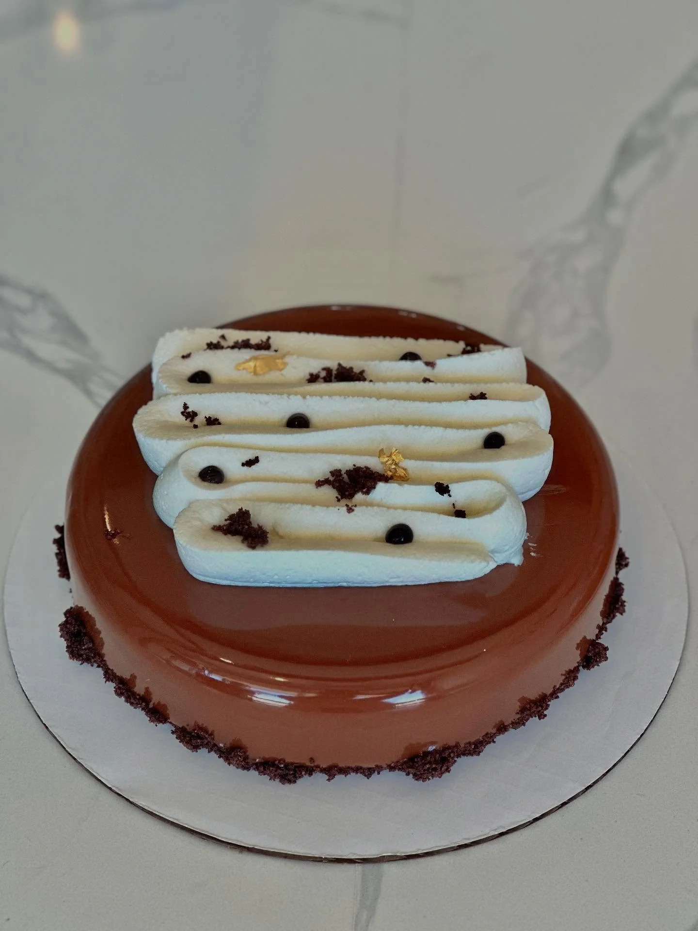 Doucuer Chocolat with new look! Milk and dark chocolate filled with sponge and crunch.. at Patisserie Chantilly, Lomita&hellip;..check it out!