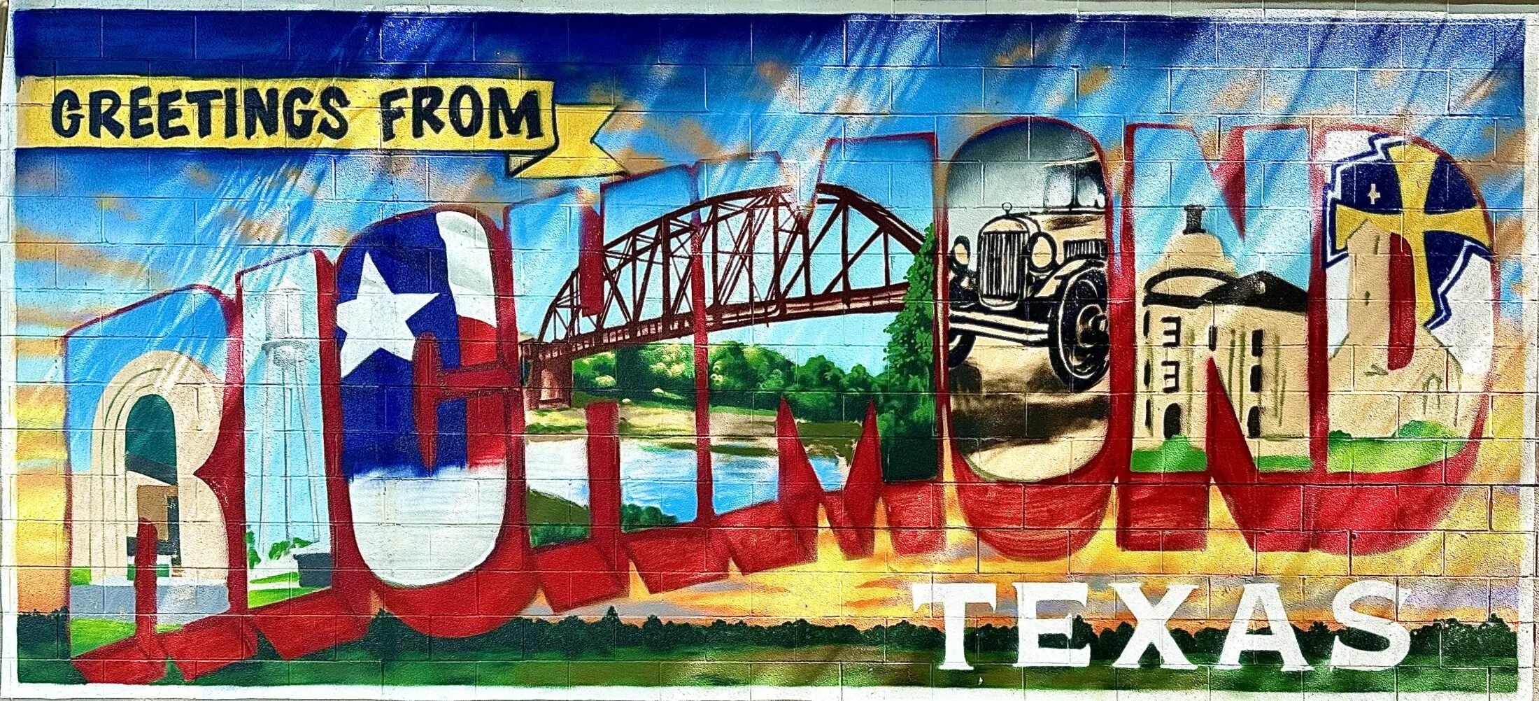 Texas mural reading “Greetings from Richmond,” used for local branding.