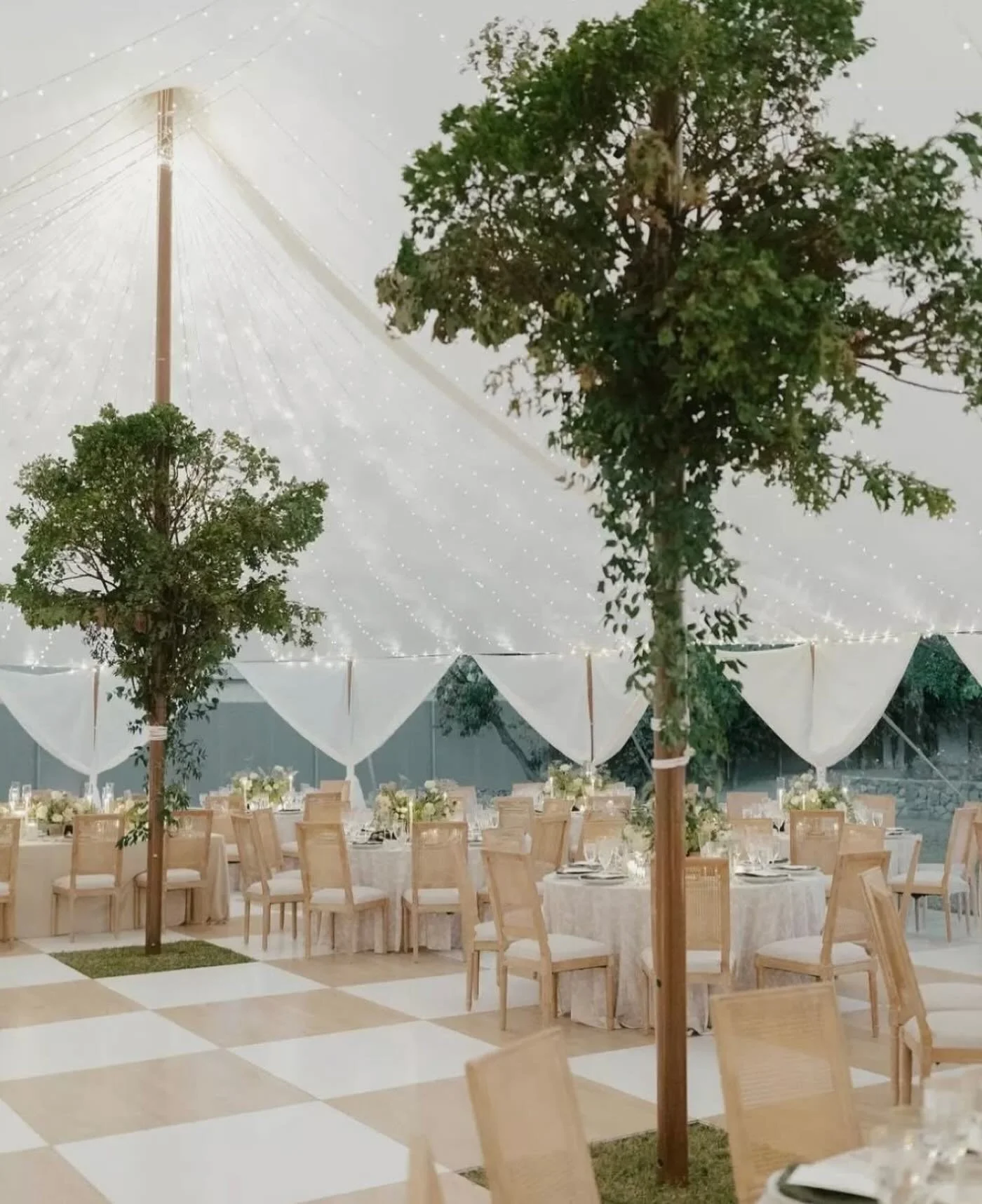 This is not our image (Pinterest) but serves as inspiration and a representation of what our sailcloth tent, bars, rentals and venue will look like. Coming Spring 2026!