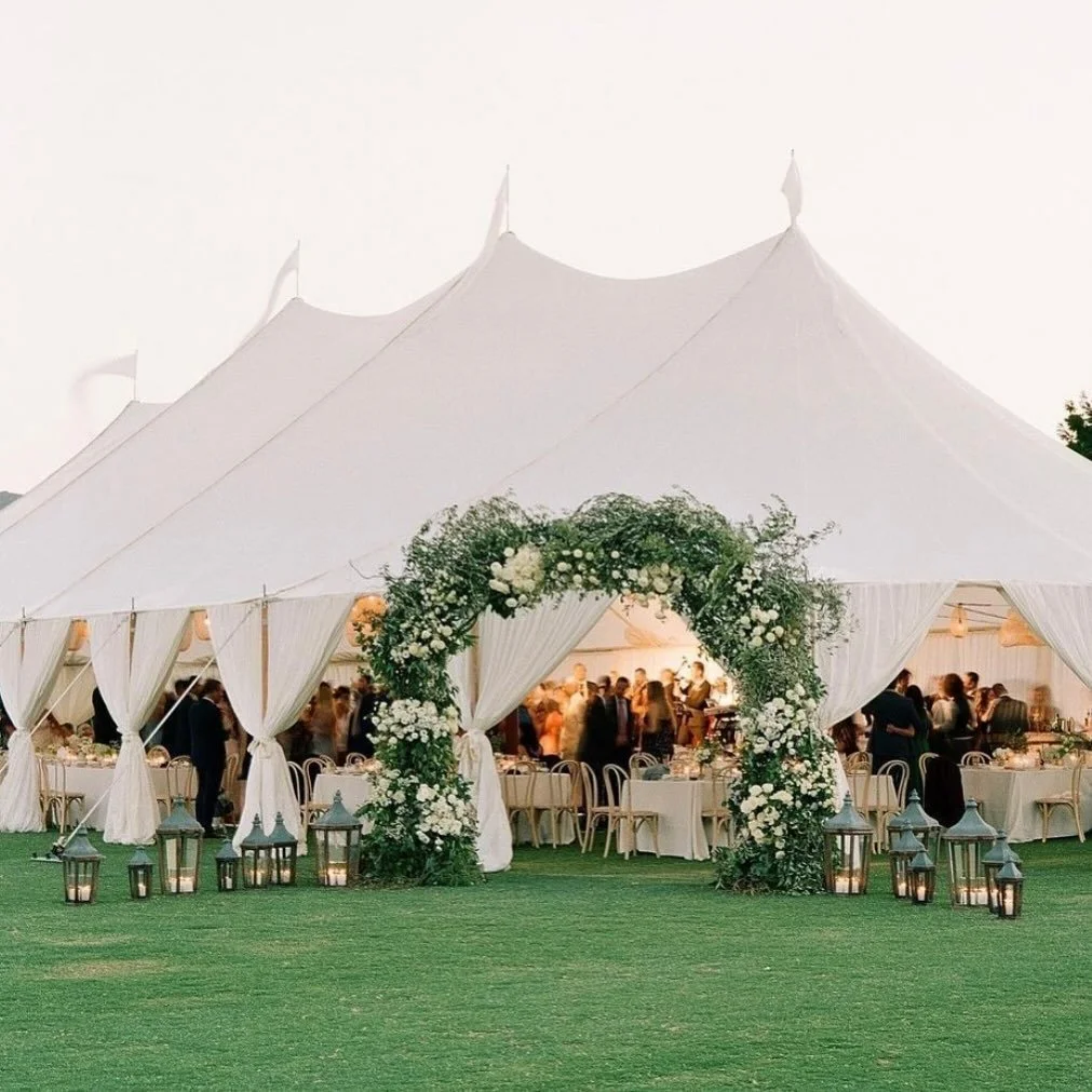 This is not our image (Pinterest) but serves as inspiration and a representation of what our sailcloth tent, bars, rentals and venue will look like. Coming Spring 2026!