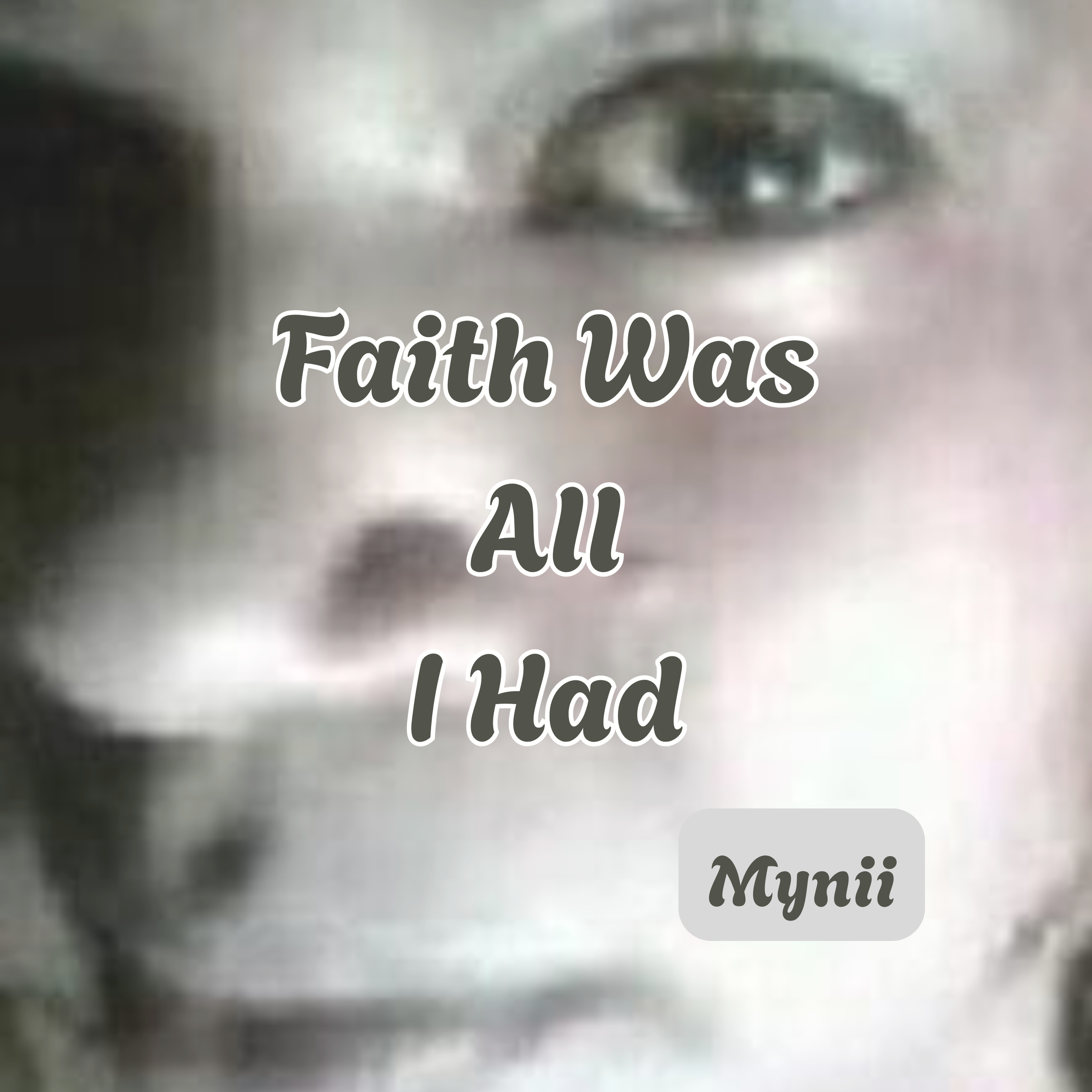 Close-up of a silver surface with the text 'Faith Was All I Had' written in black and white lettering.
