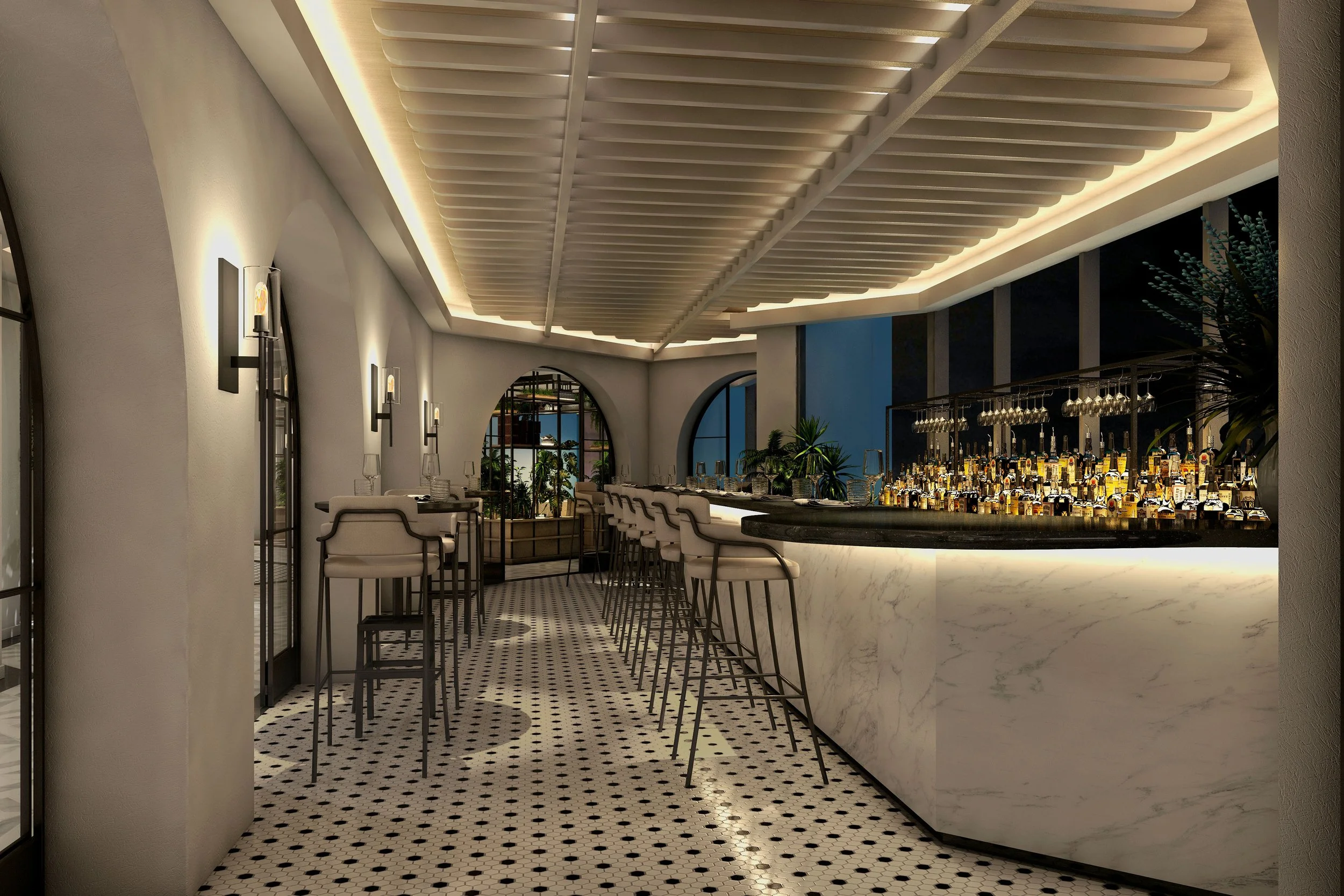 Indoor bar area with white marble counter, bar stools, and bottles of liquor, illuminated with warm lighting, decorative plants, and a patterned black and white tiled floor.