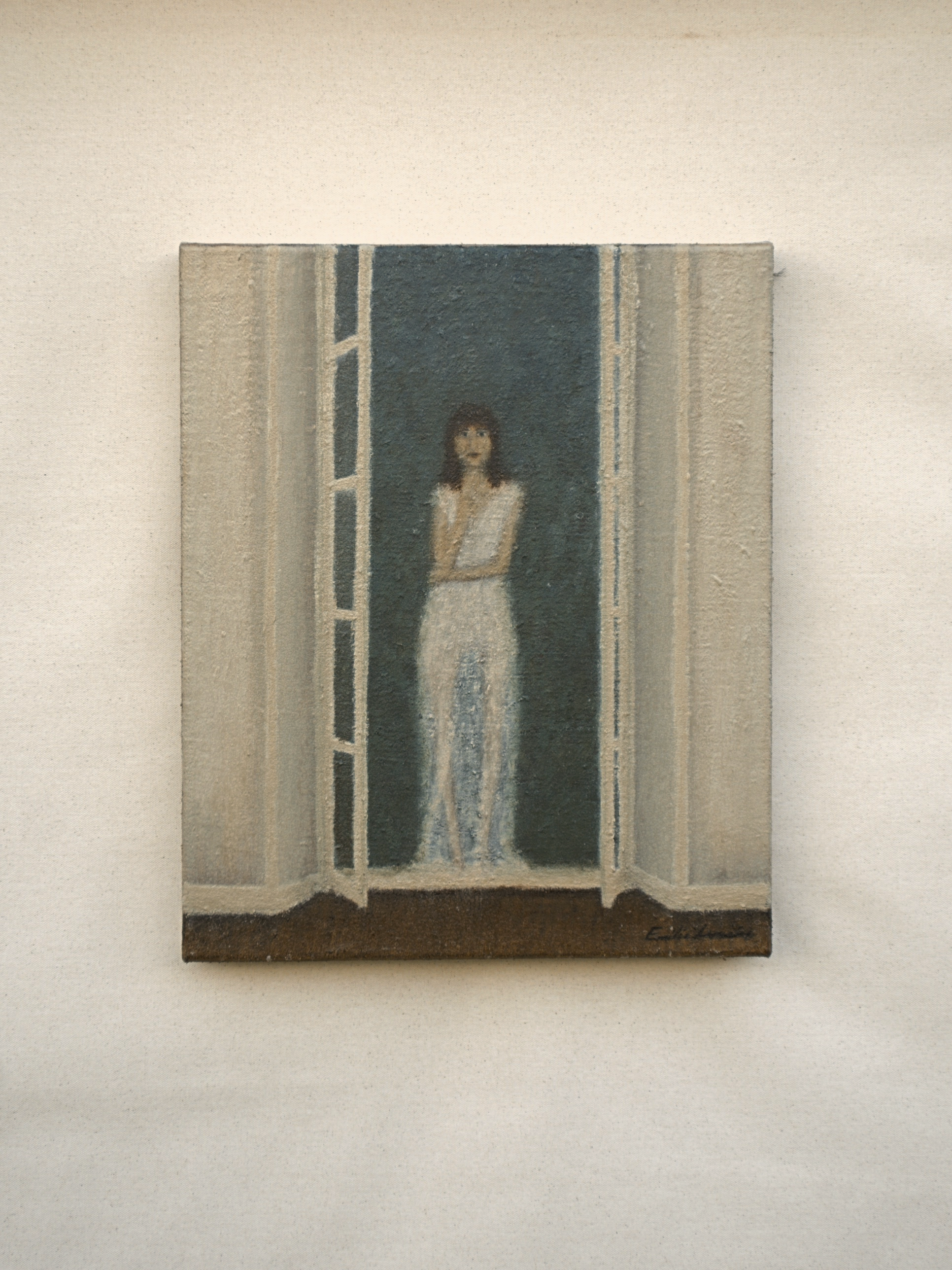 Je – Soirée by Emilia Lemaire, 2026. A dark-haired woman in a long, sheer white dress stands in an open window, framed by its two wings and the walls of the room, against a deep blue-green night.