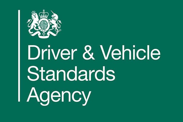 Logo of the Driver & Vehicle Standards Agency with a green background and white text.