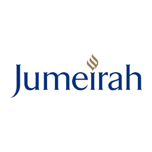 Jumeirah logo with dark blue text and a stylized gold and white emblem above the letter 'i'.