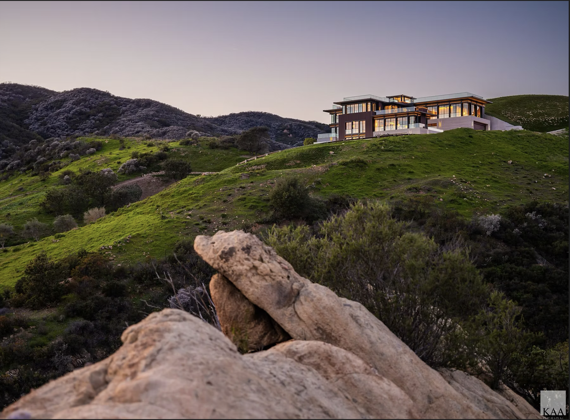 Designed for sustainability, it features a fireproof roof, low-maintenance materials, and textured concrete walls that reflect the local landscape,corrugated Corten steel and local stone ensure the residence will patina gracefully over time